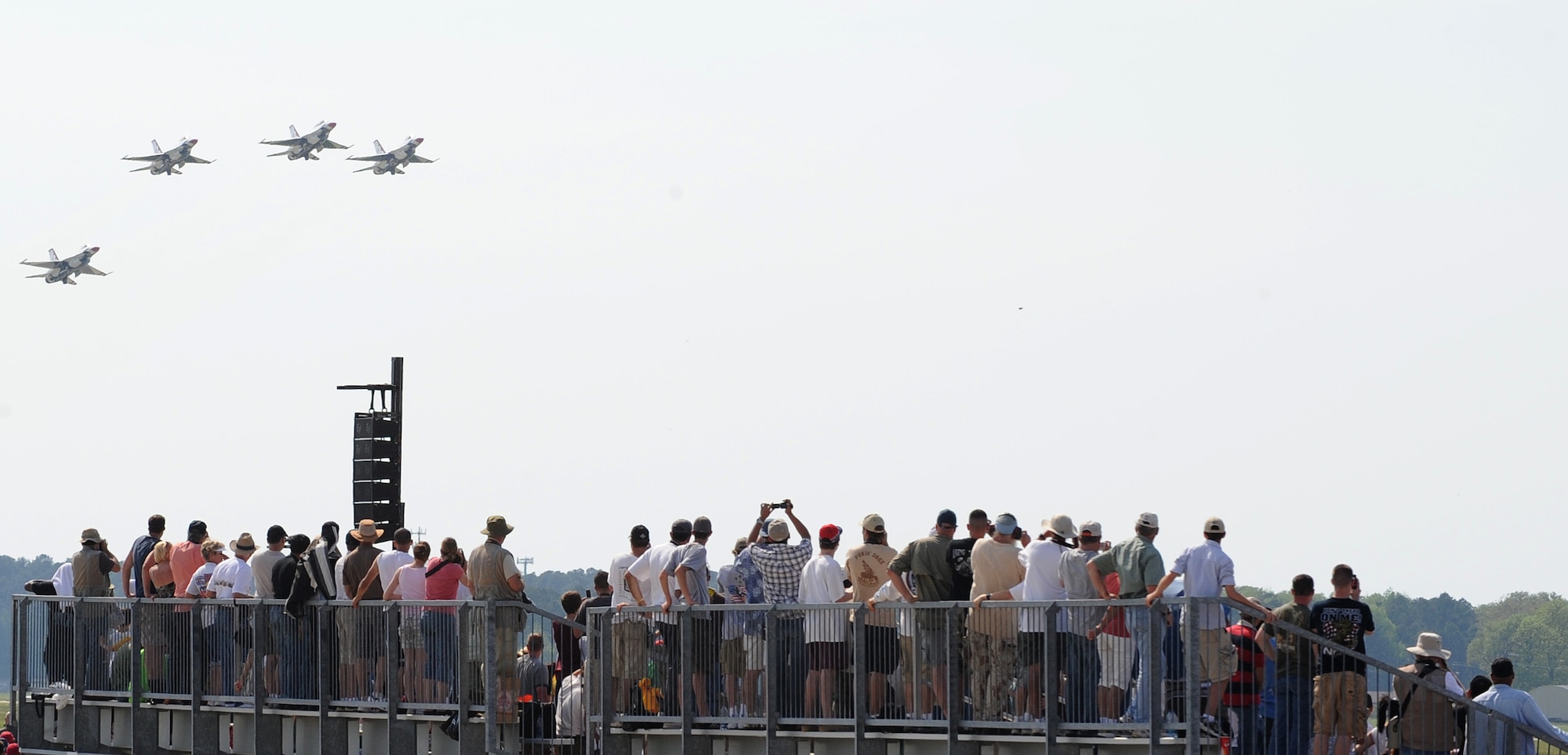 LANGLEY AIR FORCE BASE, Va. – Spectators watch as the United States Air Force Air Demonstration Squadron, the Thunderbirds, perform during AirPower over Hampton Roads April 25. Langley's open house helps educate the public on Air Force capabilities and show appreciation to the local community. (U.S. Air Force photo/Airman 1st Class Gul Crockett) 