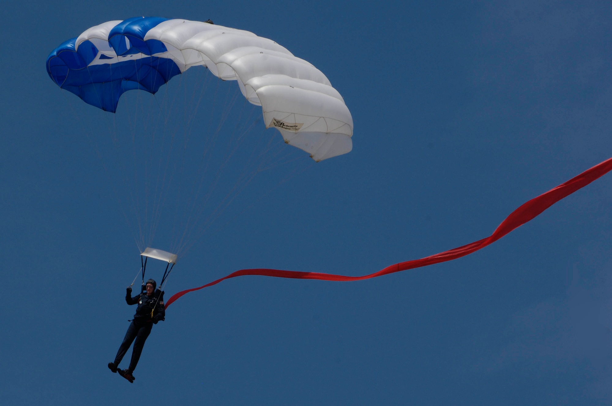 LANGLEY AIR FORCE BASE, Va. -- A member of the USAF Academy Wings of Blue Parachute Team, perform during AirPower over Hampton Roads April 25. This annual event helps educate the public on Air Force capabilities, increase recruiting and show appreciation to the local community. (U.S. Air Force photo/Airman Rebecca Montez)