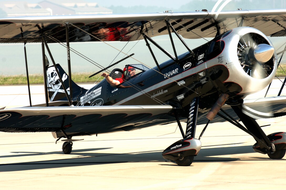 LANGLEY AIR FORCE BASE, Va. -- Kyle Franklin waves to crowd after his performance in a Waco Biplane during AirPower over Hampton Roads April 25. This annual event helps educate the public on Air Force capabilities, increase recruiting and show appreciation to the local community. (U.S. Air Force photo/Tech. Sgt. Travis Aston)
