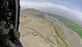 Tech. Sgt. Jedediah Smith, 101st Expeditionary Rescue Squadron pararescueman, surveys the landscape for threats during a training mission in Northeastern Afghanistan April 20. (Air Force/Staff Sgt. Jason Lake)