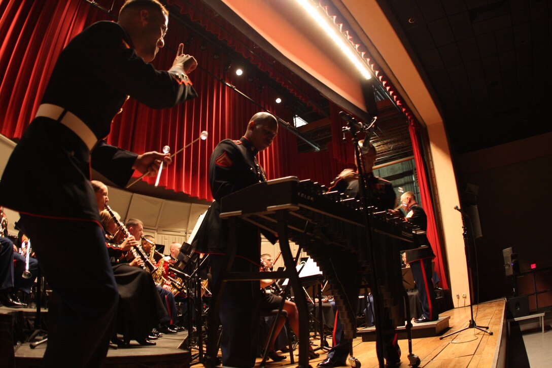 Percussionists with the Combat Center band put on a show for the crowd during Sunday’s Coats of Red and Blue 2 concert at the Sunset Cinema.