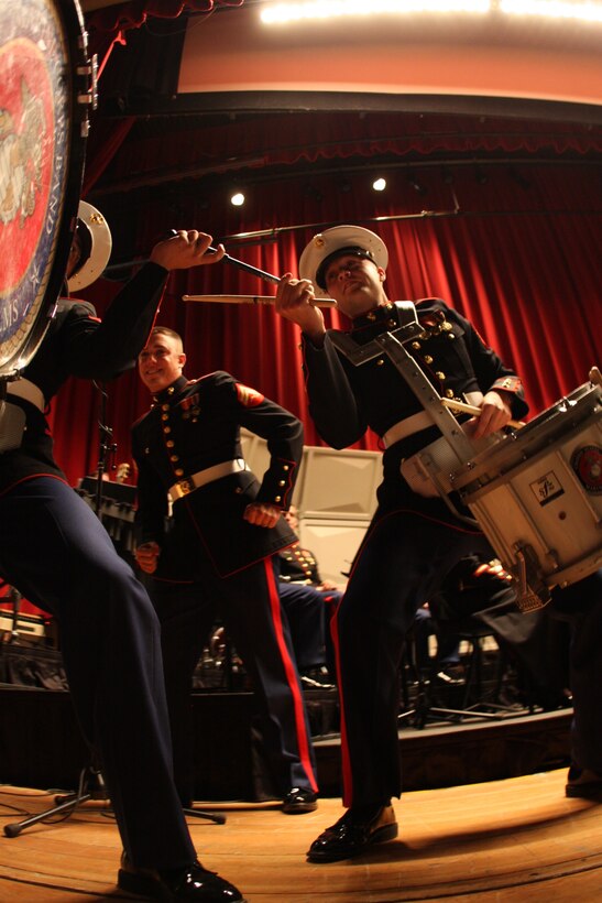 Percussionists with the Combat Center band put on a show for the crowd during Sunday’s Coats of Red and Blue 2 concert at the Sunset Cinema.