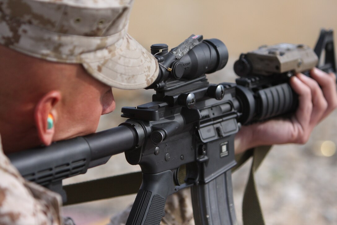 Sgt. Daniel Jacobson, a tank commander with Company C, 1st Tank Battalion, sights in on his target during the most recent Combat Marksmanship Coaches course here taking place April 20 through May 8.