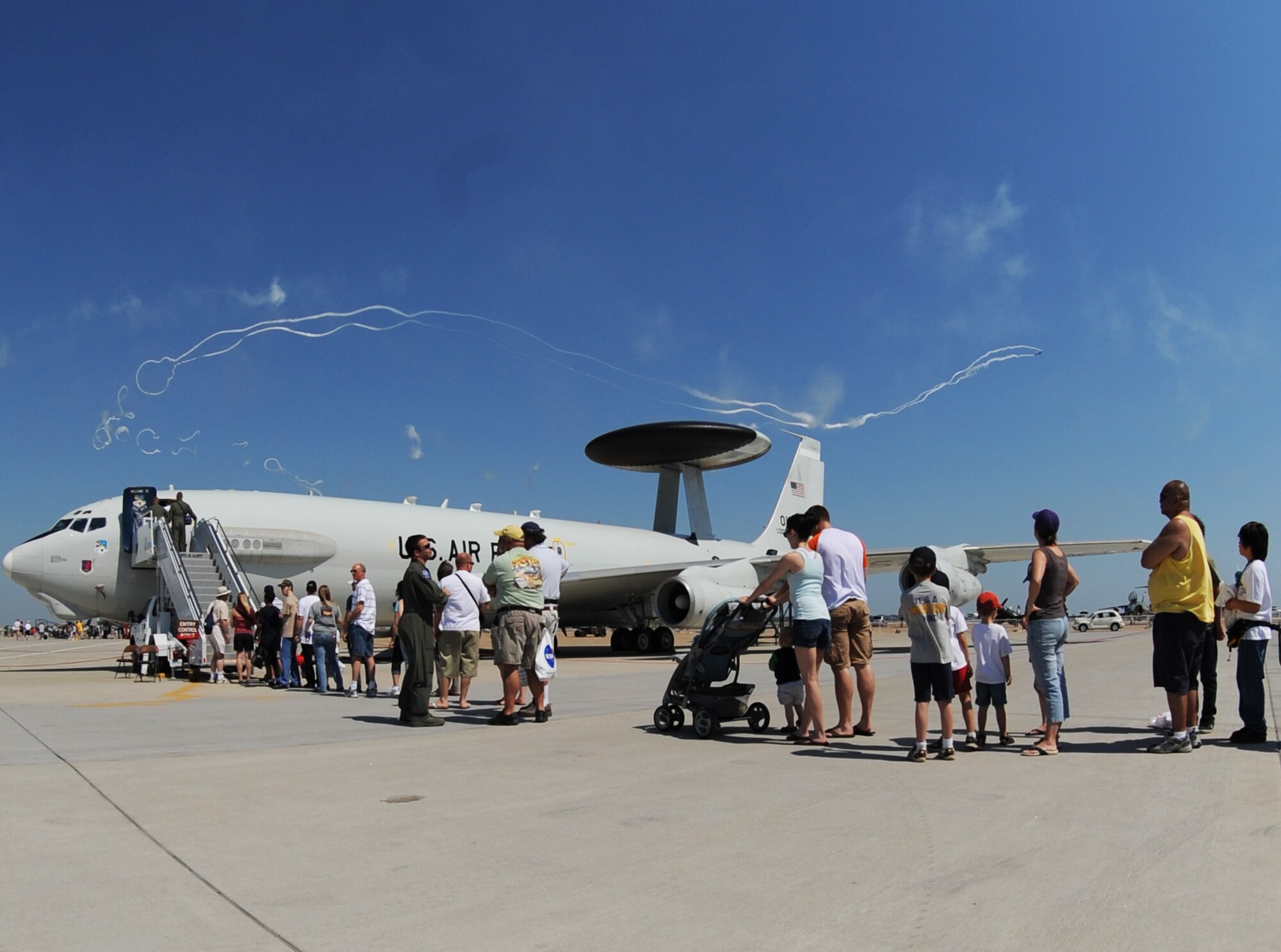 LANGLEY AIR FORCE BASE, Va.-- Spectators stand in line to see the inside of an E-3 Sentry, an airborne warning and control system, during AirPower over Hampton Roads here April 25. This annual event helps educate the public on Air Force capabilities, increase recruiting and show appreciation to the local community. (U.S. Air Force photo/ Senior Airman Scott Aldridge) 
 