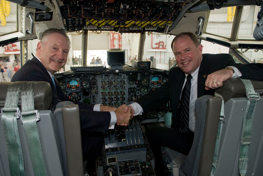 City of Fort Worth Mayor Mike Moncrief and Fort Worth City Manager Dale Fisseler celebrate the dedication of a U.S. Air Force C-130 aircraft 85-1368 from the 136th Airlift Wing. The aircraft will permanently fly with the "City of Fort Worth" inscription over the crew entrance door. Dedication took place at Carswell Field, NAS/JRB, Fort Worth, Texas, 25 April 2009.(Photo by Master Sgt. Michael Lachman) 
