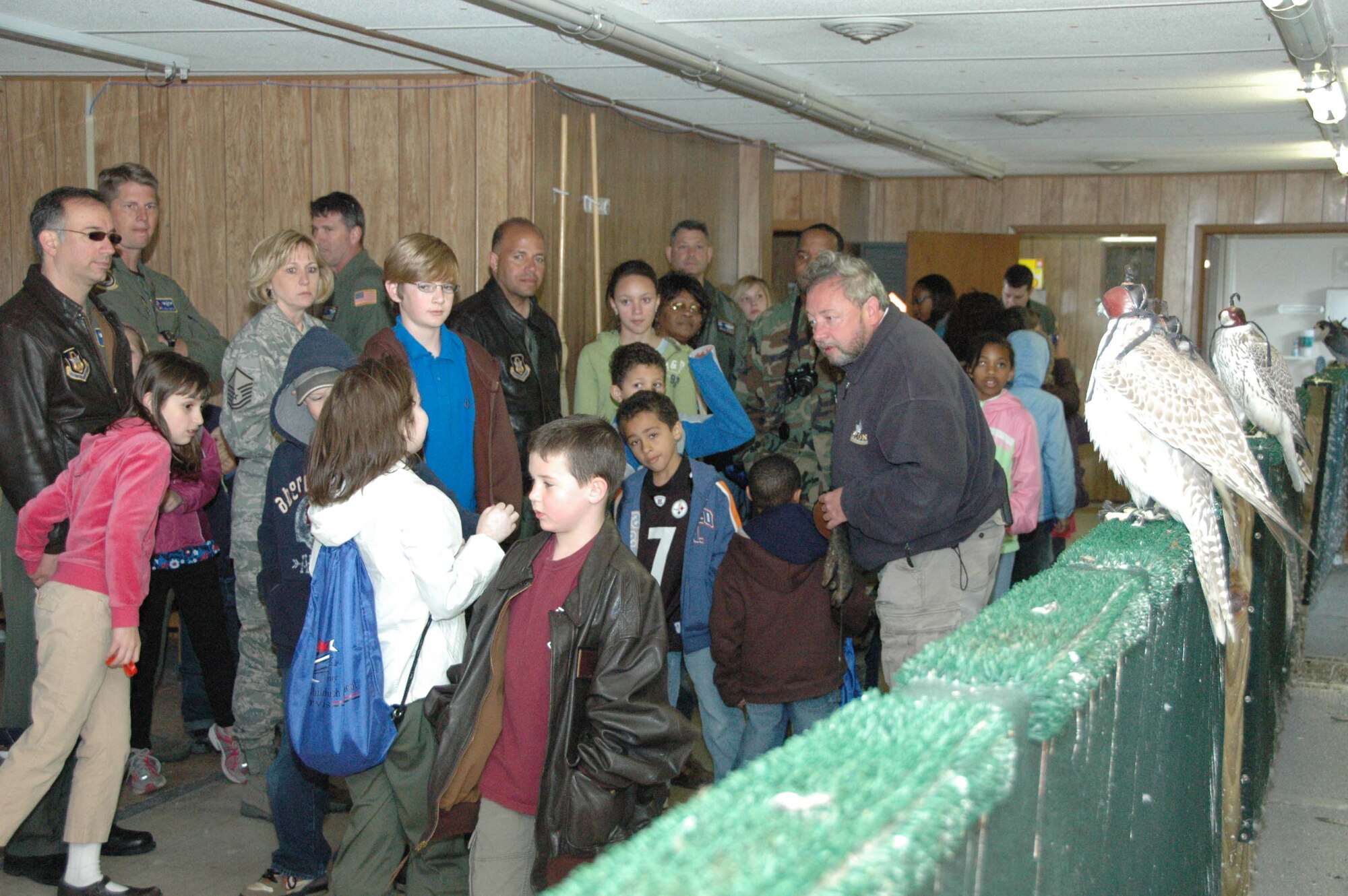 MCGUIRE AIR FORCE BASE, N.J. -- More than 50 Citizen-Airmen children participated in the 2009 Bring Your Sons and Daughters to Work event held April 23 at McGuire Air Force. In addition to seeing their parent's work areas the children toured the C-17 and KC-10 aircraft and learned about the base's bird strike avoidance program during a visit to the Falcon Environmental Services section. (U.S. Air Force photo by/Master Sgt. Donna T. Jeffries)