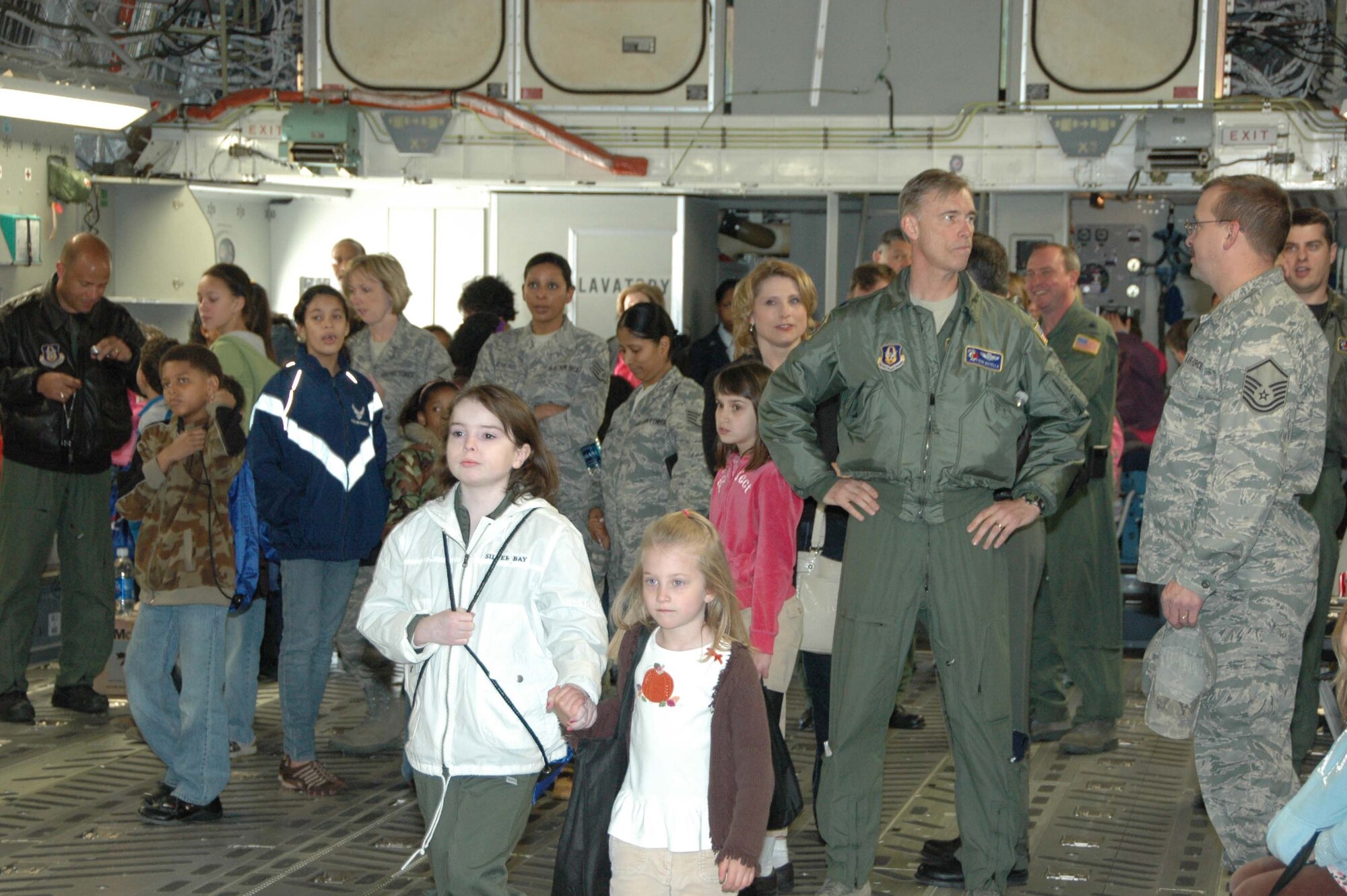 MCGUIRE AIR FORCE BASE, N.J. -- More than 50 Citizen-Airmen children participated in the 2009 Bring Your Sons and Daughters to Work event held April 23 at McGuire Air Force. In addition to seeing their parent's work areas the children toured the C-17 and KC-10 aircraft and learned about the base's bird strike avoidance program during a visit to the Falcon Environmental Services section. (U.S. Air Force photo by/Master Sgt. Donna T. Jeffries)