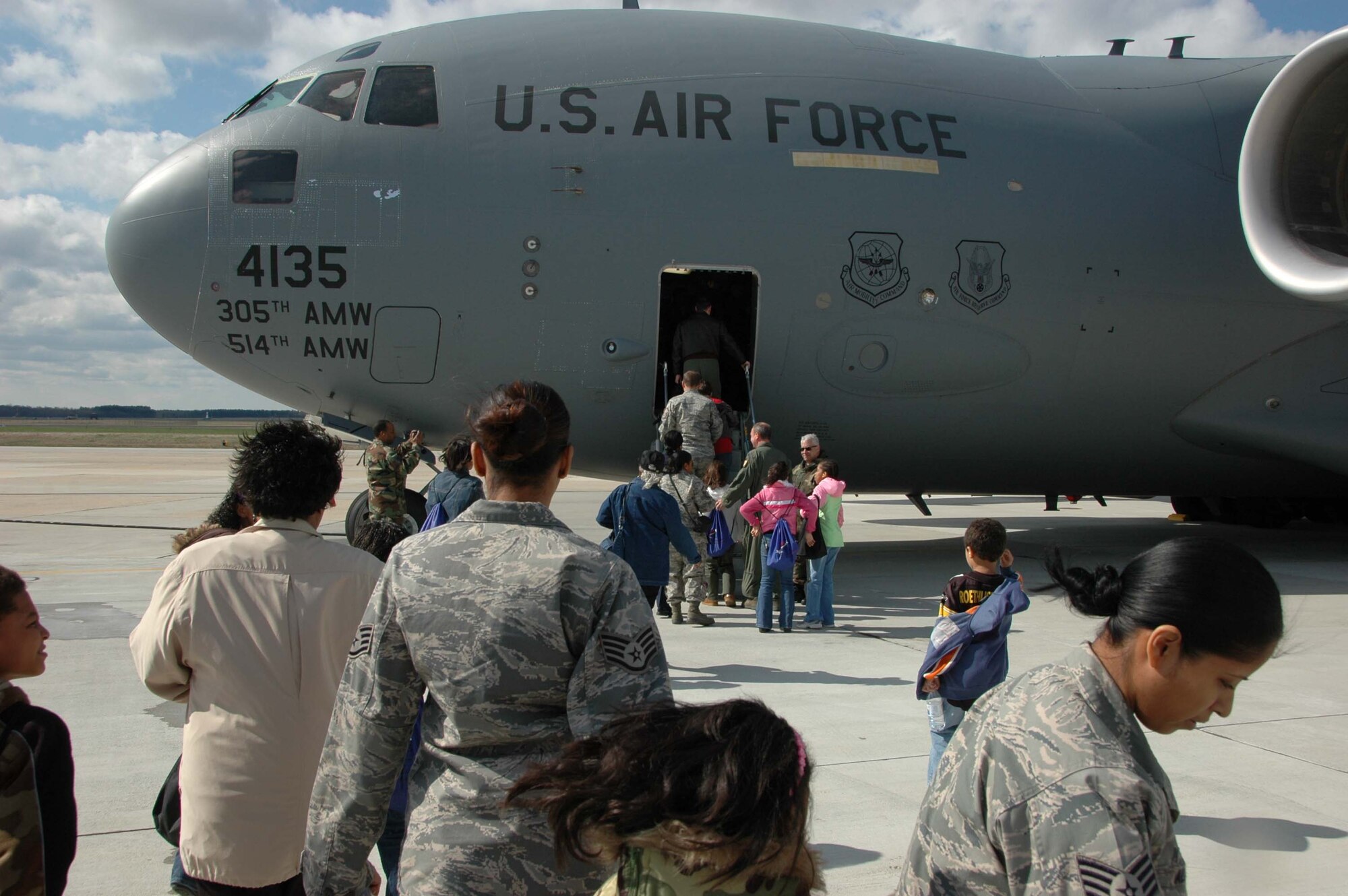 MCGUIRE AIR FORCE BASE, N.J. -- More than 50 Citizen-Airmen children participated in the 2009 Bring Your Sons and Daughters to Work event held April 23 at McGuire Air Force. In addition to seeing their parent's work areas the children toured the C-17 and KC-10 aircraft and learned about the base's bird strike avoidance program during a visit to the Falcon Environmental Services section. (U.S. Air Force photo by/Master Sgt. Donna T. Jeffries)
