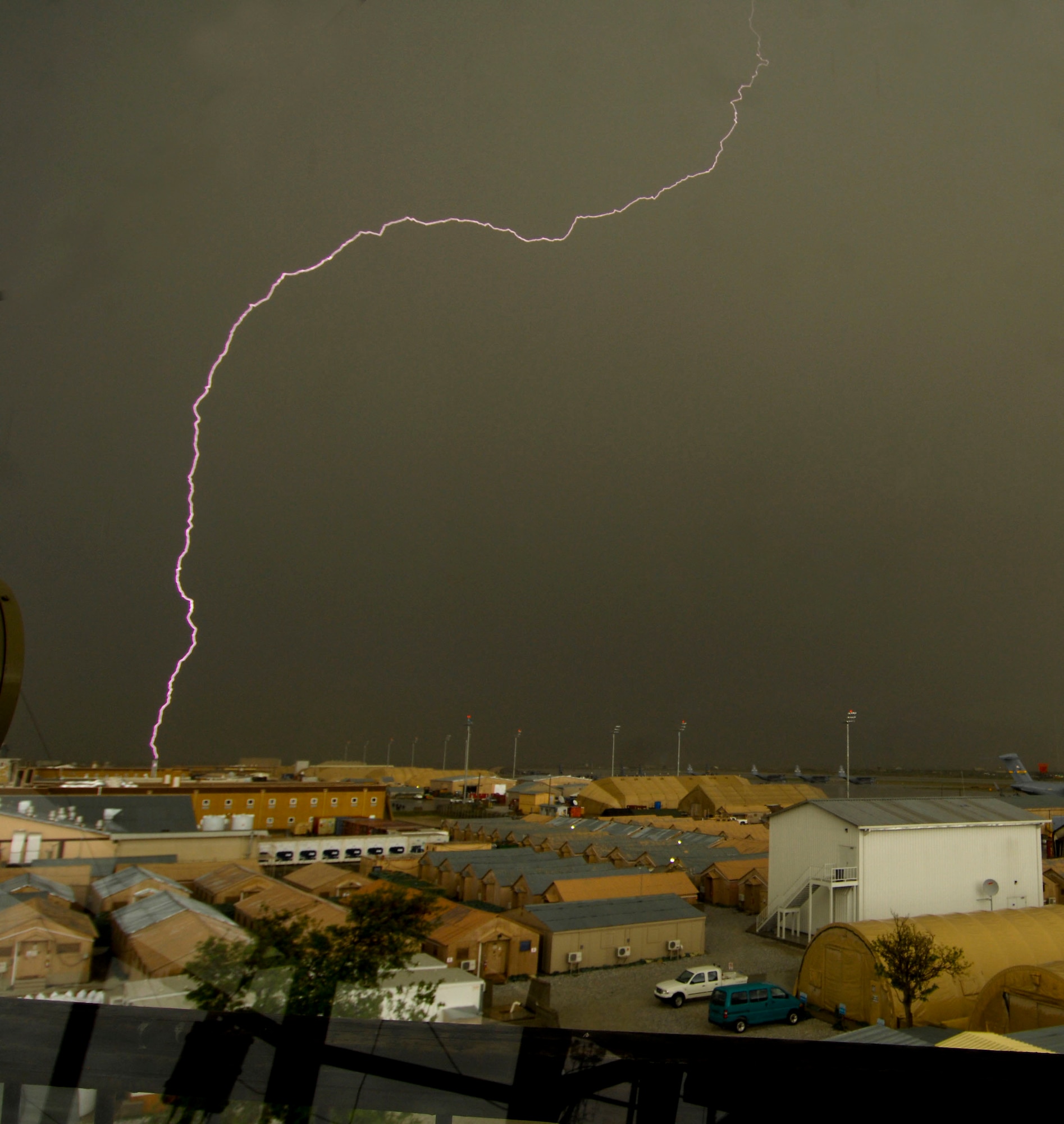 Lightning strikes in the Hindu Kush basin near Bagram Air Field, Afghanistan, April 20.  The 455th Expeditionary Operations Support Squadron, combat weather team, can predict lightning and thunder with the use of a Tactical Meteorological Observing System. This technology allows the weather team to issue a lightning warning on BAF to ensure the security and safety of all personnel. ?It is unusual to have lightning strike within five nautical miles within the basin of Bagram, but on average there are 22 recorded strikes throughout the fiscal year,? said Master Sgt. James Lee, non-commissioned officer in charge of the CWT. (U.S. Air Force photo/ Senior Airman Erik Cardenas)(Released)