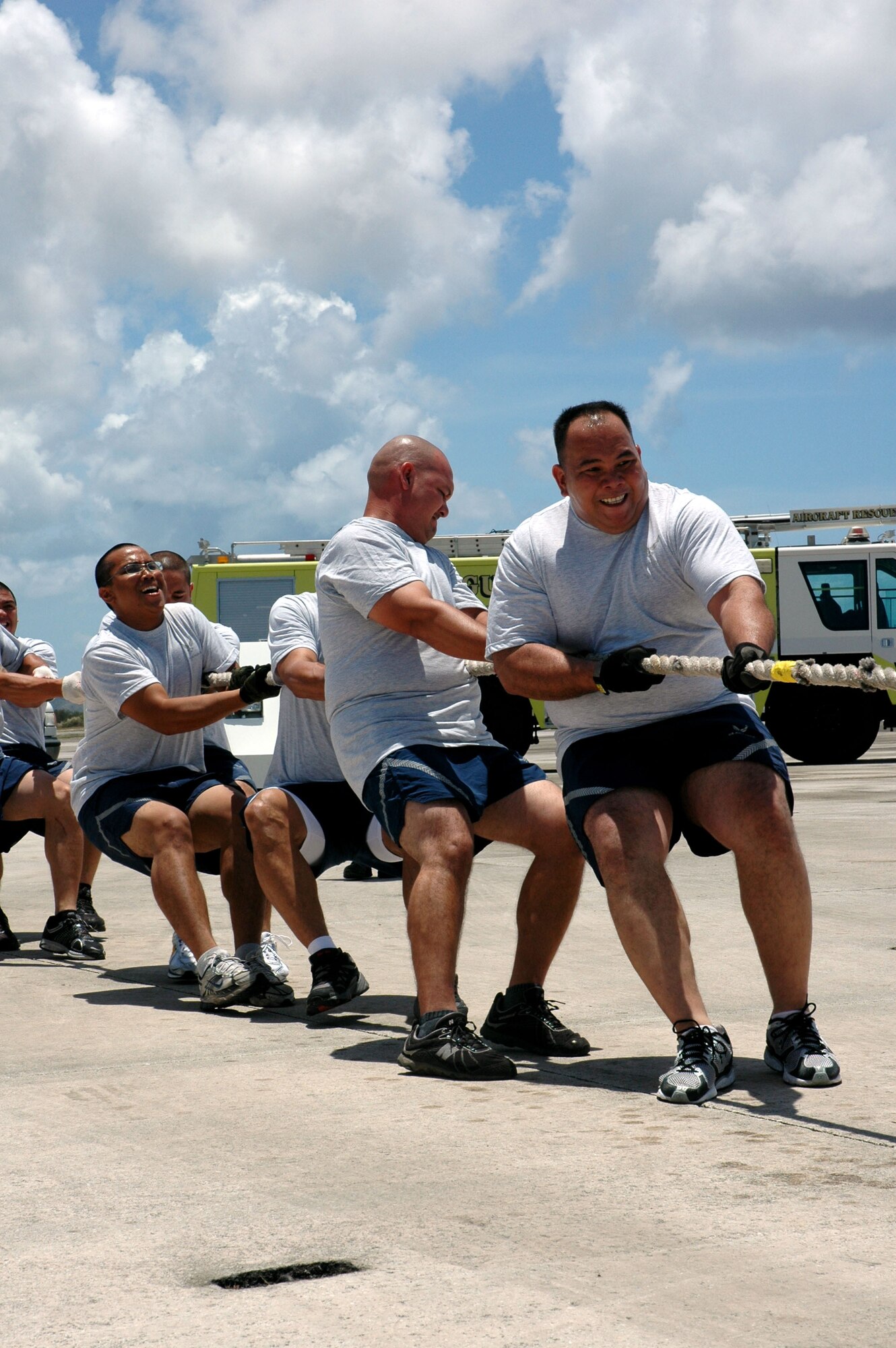 Air Force Reservists based at Andersen participated in Saturday's Plane Pull to help raise money for the American Cancer Society. A team of 20 Reservists from the 44th Aerial Port Squadron pulled the Boeing 737 12 feet in 5.81 seconds, the best time out of all the military teams participating in the competition. The Air Force Reserve team tied for 5th overall. The event was held at the Continental Airlines hangar in Tiyan. The 44th APS is part of the 624th Regional Support Group, which is the largest Air Force Reserve presence in the Pacific. (U.S. Air Force photo/Capt. Christy Stravolo)