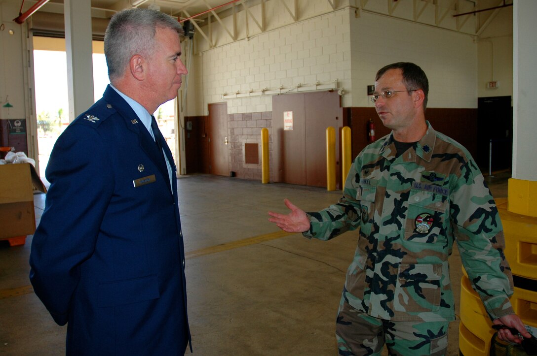 Lt. Col. Steven Shinkel, 734th Air Mobility Squadron commander, briefs Col. Robert “Randy” Huston, 624th Regional Support Group commander, on the aerial port mission April 21 at Andersen Air Force Base, Guam.  Reservists with the 44th Aerial Port Squadron, which falls under the 624th RSG, work alongside active duty Airmen from the 734th AMS to accomplish the Air Force mission.  This was Colonel Huston’s first visit to the base since assuming command in January.  The 624th RSG has units in Guam and Hawaii and is the largest Air Force Reserve presence in the Pacific.  (U.S. Air Force photo/Capt. Christy Stravolo)