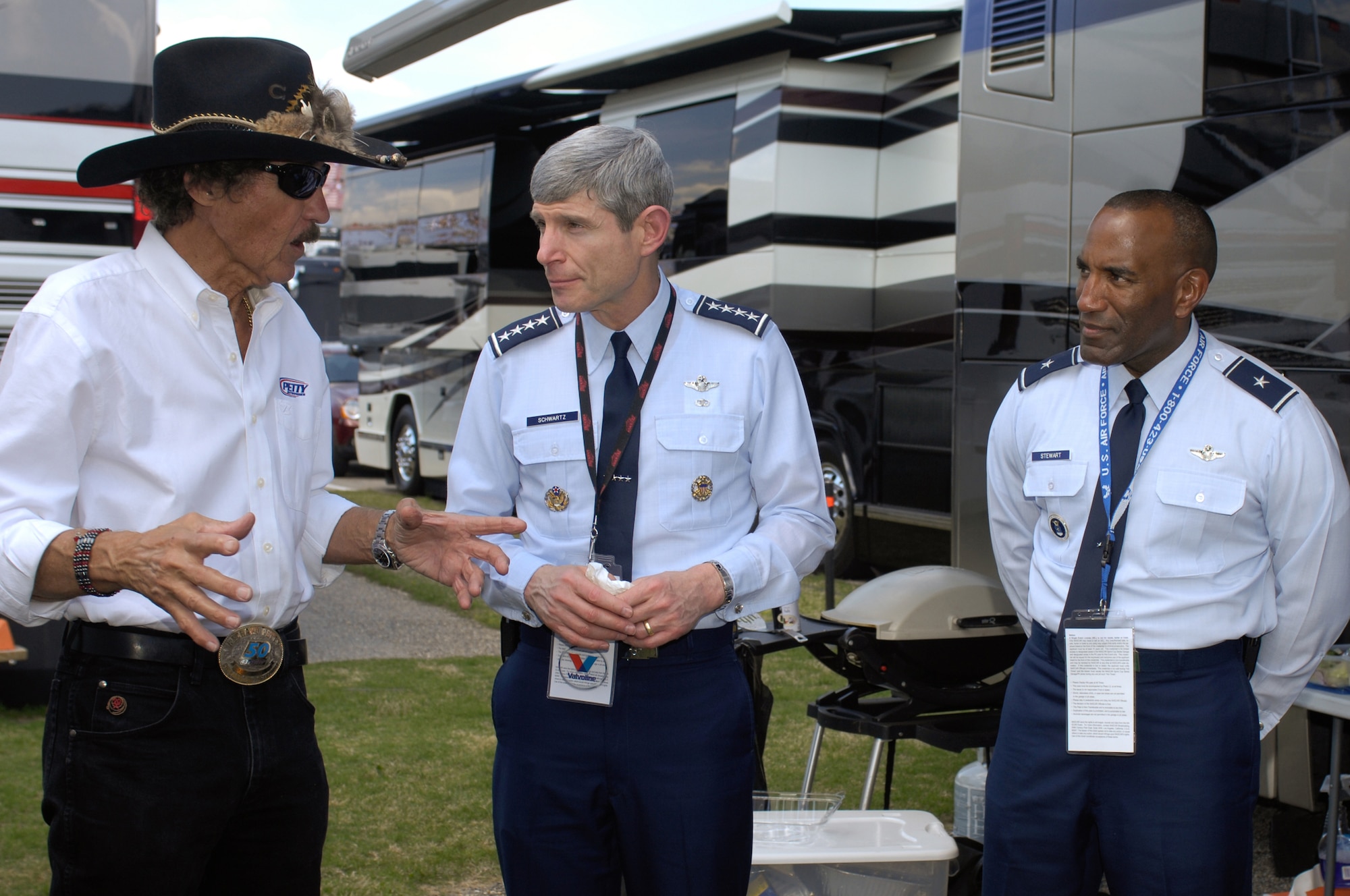 Air Force Chief of Staff Gen. Norton Schwartz (center) and Brig. Gen. A.J. Stewart, the Air Force Recruiting Service commander, talk to Richard Petty prior to the start of the NASCAR race April 26 at the Talladega Superspeedway in Talladega, Ala.  The generals were at the race to watch the #43 Richard Petty Motor Sports car run.  The car, driven by Reed Sorenson, featured the Air Force primary paint scheme for the first time.  (U.S. Air Force photo/Master Sgt. Scott Reed)