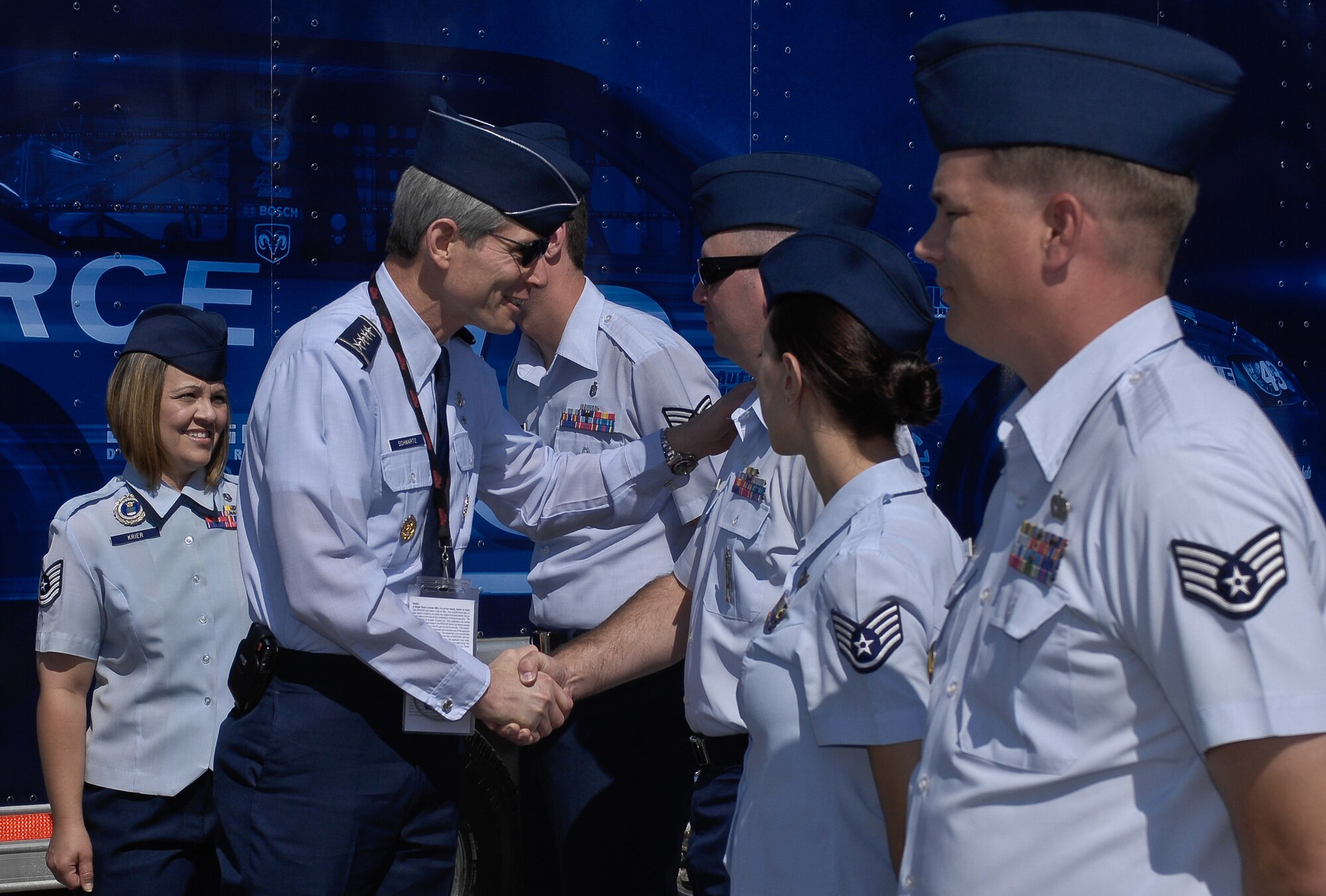 Air Force Chief of Staff Gen. Norton Schwartz meets recruiters from the 331st recruiting squadron April 26 at the Talladega Superspeedway in Talladega, Ala.  General Schwartz was at the NASCAR race in Talladega, Ala., to watch the #43 car run.  The car, driven by Reed Sorenson, featured the Air Force primary paint scheme for the first time.  (U.S. Air Force photo/Master Sgt. Scott Reed)