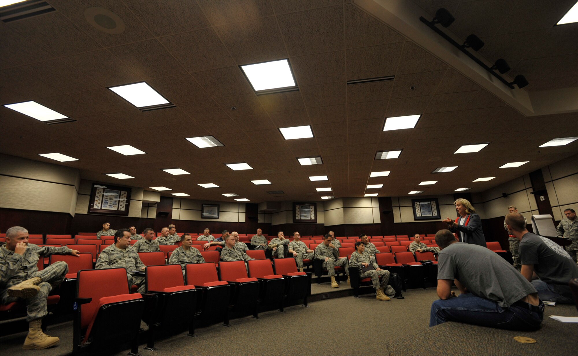 Mary Borst, the 931st Air Refuling Group's budget officer, talks to Airmen about military pay issues during a pre-deployment meeting Monday. Airmen from the 931st Aircraft Maintenance Squadron and the 18th Air Refueling Squadon (the 931st's flying unit) were scheduled to depart for their deployment from here Tuesday. The 931st Air Refueling Group is an Air Force Reserve unit at McConnell Air Force Base, Kan. (U.S. Air Force photo/Tech. Sgt. Jason Schaap) 
