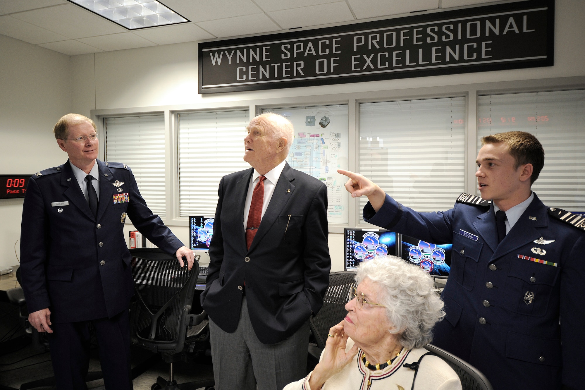 Sen. John Glenn and his wife Annie are briefed by Cadet 1st Class Jacob Schonig April 22 about FalconSat operations in the Wynne Space Professional Center of Excellence.  Senator Glenn was at the Academy to be honored as the recipient of the 2008 Thomas D. White National Defense Award.  (U.S. Air Force photo/Dennis Rogers)