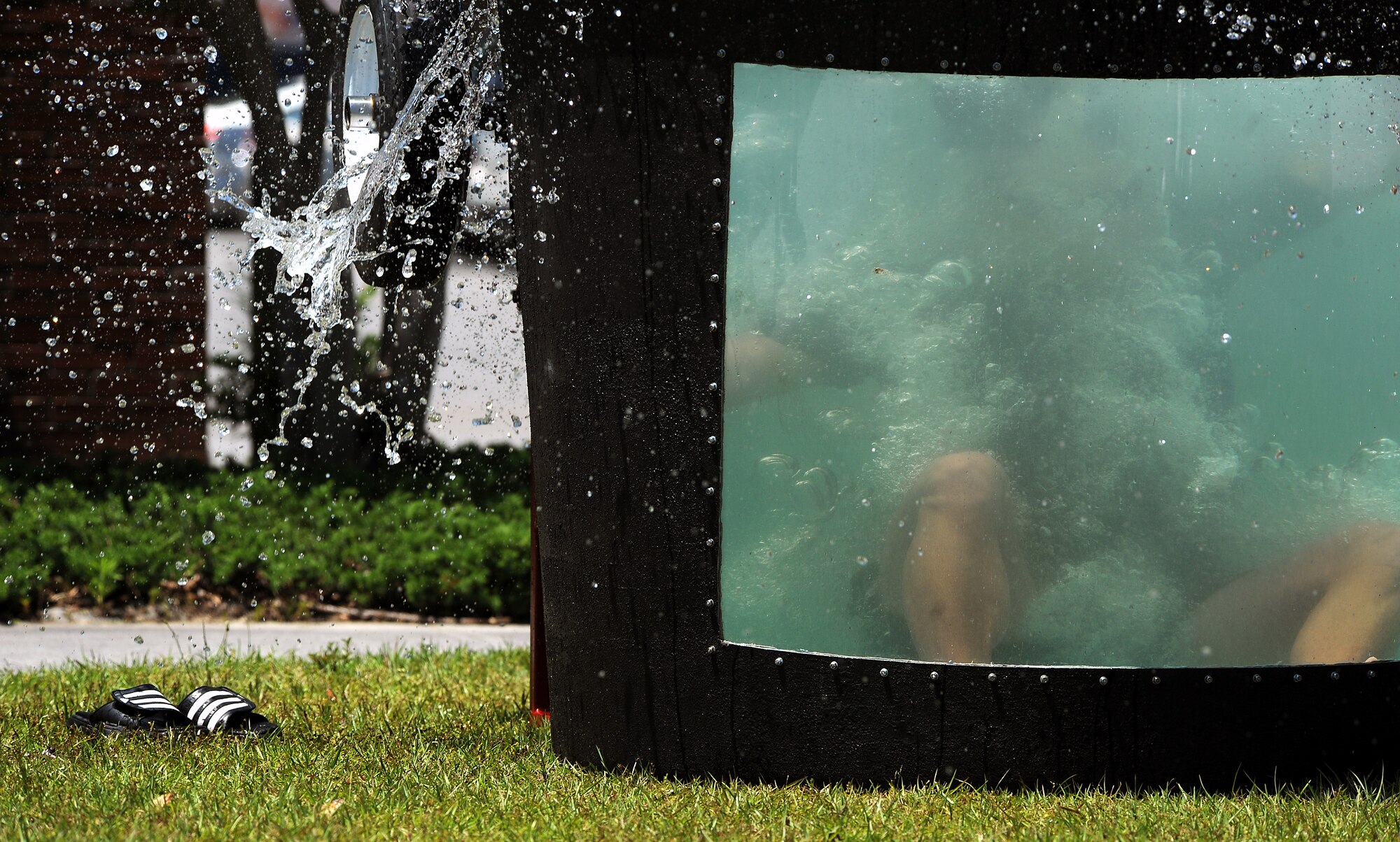 MOODY AIR FORCE BASE, Ga. -- Master Sgt. Chad Case, 23rd Aircraft Maintenance Squadron first sergeant, goes down in the dunk tank during Airmen Appreciation Day here April 24. Airmen Appreciation Day is held for Airmen who hold the rank of E-4 and below to show gratitude and thanks to the young men and women of Moody for their hard work and dedication. (U.S. Air Force photo by Airman 1st Class Joshua Green) 