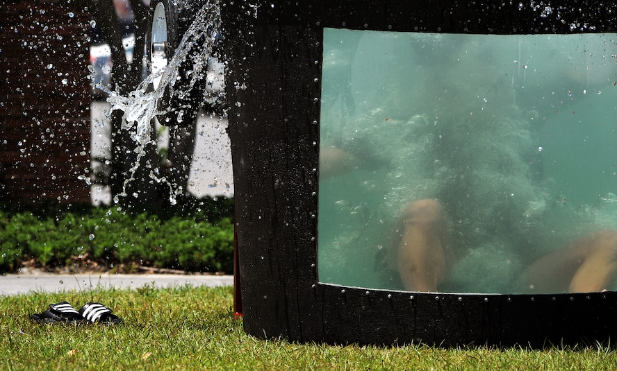 MOODY AIR FORCE BASE, Ga. -- Master Sgt. Chad Case, 23rd Aircraft Maintenance Squadron first sergeant, goes down in the dunk tank during Airmen Appreciation Day here April 24. Airmen Appreciation Day is held for Airmen who hold the rank of E-4 and below to show gratitude and thanks to the young men and women of Moody for their hard work and dedication. (U.S. Air Force photo by Airman 1st Class Joshua Green) 