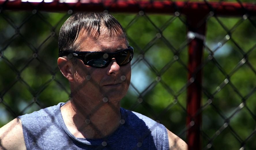 MOODY AIR FORCE BASE, Ga. -- Senior Master Sgt. Clarence Rogers, 23rd Logistics Readiness Squadron first sergeant, taunts Airmen while they attempt to knock him in the dunk pool during Airmen Appreciation Day here April 24. Senior leadership showed support for the event by allowing Airmen the chance to knock them in the dunk tank. (U.S. Air Force photo by Airman 1st Class Joshua Green)