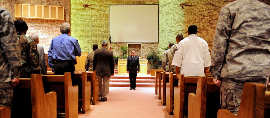MOODY AIR FORCE BASE, Ga. -- Joe Proctor, 23rd Force Support Squadron financial analyst, sings the National Anthem for the Holocaust Days of Remembrance ceremony held at the Chapel here April 21. The nation’s annual commemoration of the remembrance day of the Holocaust is April 21. (U.S. Air Force photo by Airman 1st Class Joshua Green) 