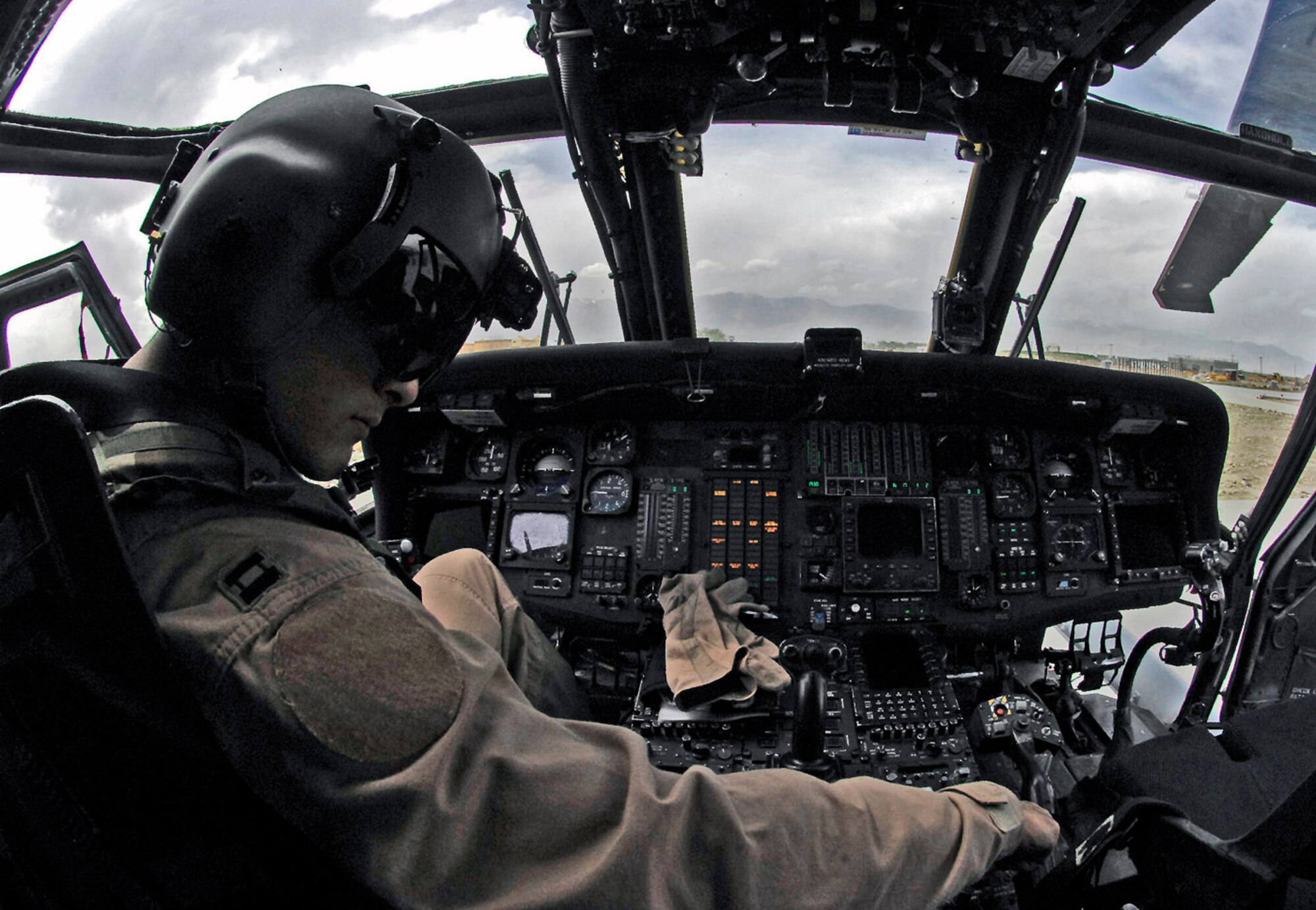 Capt. Tamar Hassan conducts preflight checks on an HH-60 Pave Hawk prior to a training mission April 20 at Bagram Airfield, Afghanistan. Captain Hassan is a 101st Expeditionary Rescue Squadron pilot. (U.S. Air Force photo/Staff Sgt. Jason Lake) 
