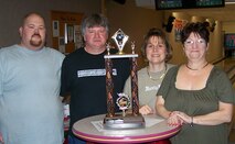 The Warehousers took first place in the Extramural Invitational Bowling tournament April 15, defeating the 71st Medical Group B team. The Warehousers are, left to right, John Butcher, Gary Stroble, Dianne Stroble and Charlotte Smith. Not pictured is Roy Smith. (Courtesy photo)

