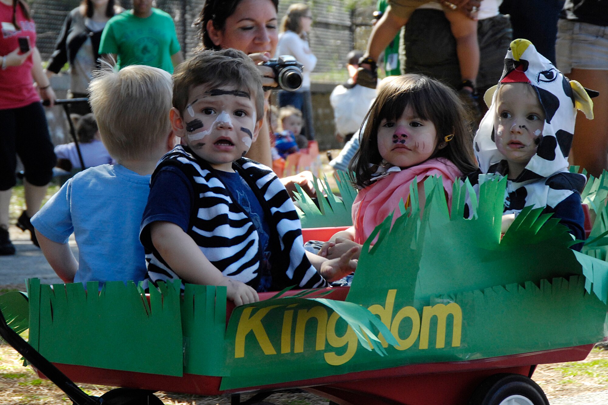 HANSCOM AIR FORCE BASE, Mass. – Hanscom Child Development Center children ride aboard their animal kingdom float during the Center’s Fantastic Floats parade, April 24. Pictured from left to right are Matthew Mann, Noah D’Olympia, Eva Sagredo and Adam Picariello. (U.S. Air Force photo by Linda LaBonte Britt)