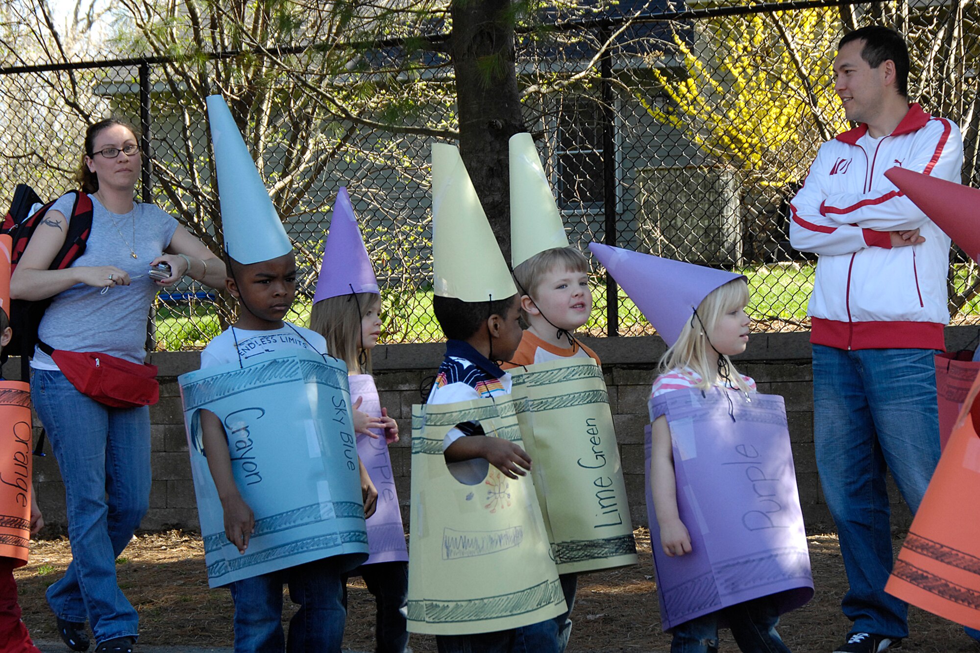 HANSCOM AIR FORCE BASE, Mass. – Children enrolled in the Hanscom Child Development Center show off their colors during the Fantastic Floats parade on April 24. The parade was part of the CDC’s Month of the Military Child celebrations. (U.S. Air Force photo by Linda LaBonte Britt)