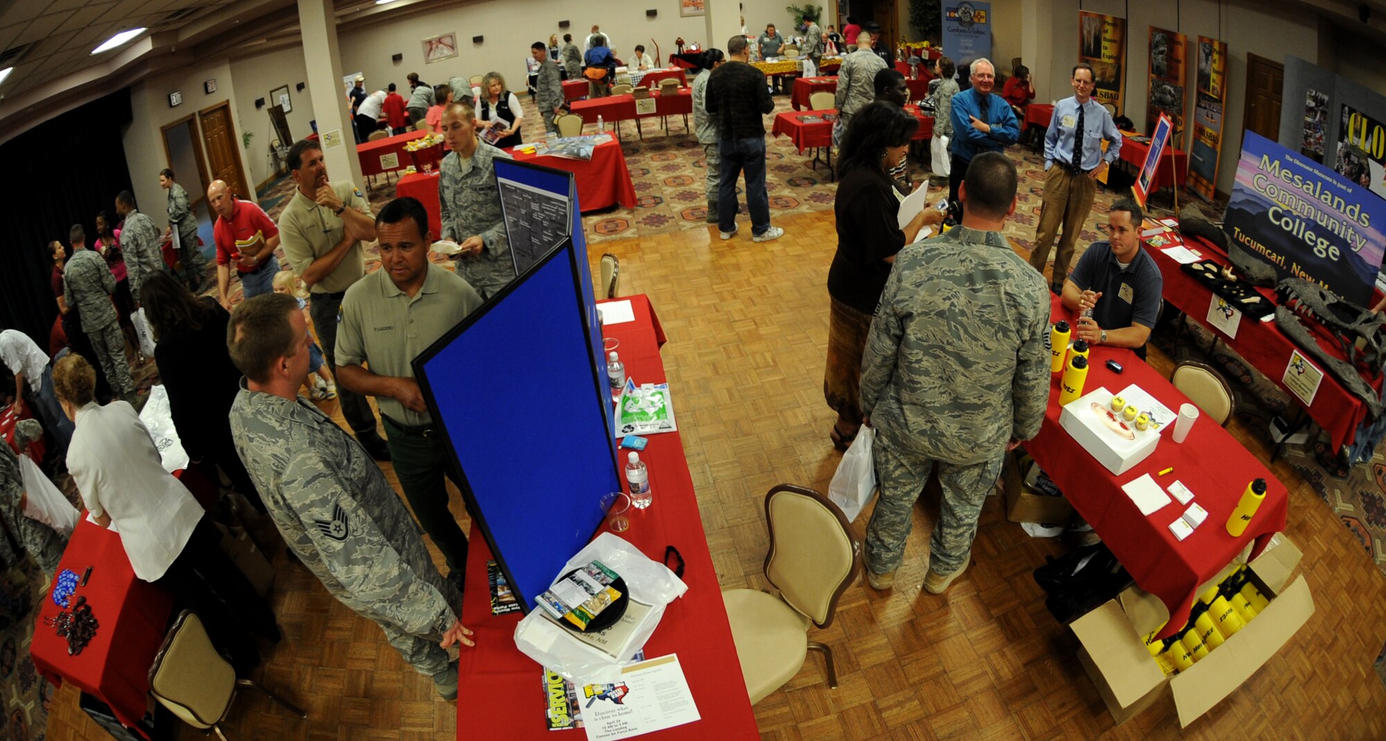 CANNON AIR FORCE BASE, N.M.-- Airmen visit different tables at The Landing during the Discover Home Fair April 24. The fair gives base Airmen an opportunity to see what events and activities New Mexico and West Texas have to offer. (U.S. Air Force photo/Airman 1st Class Evelyn Chavez) 