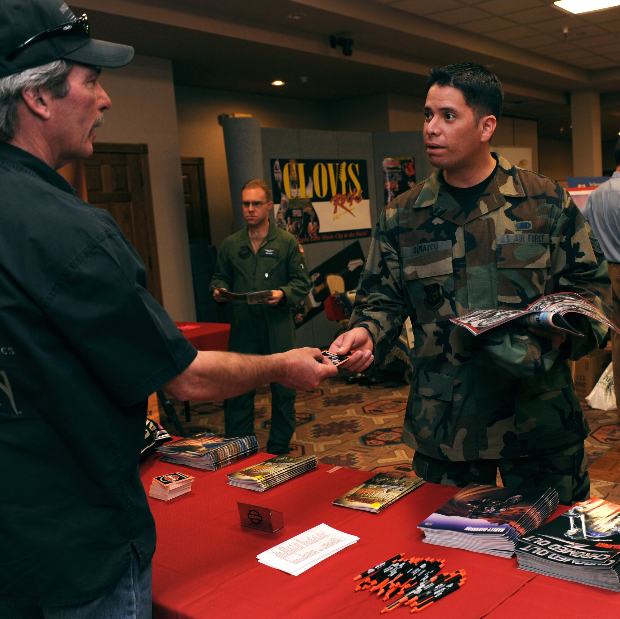 CANNON AIR FORCE BASE, N.M.-- Senior Airman Mauricio Renazco, 27th Special Operations Logistics Readiness Squadron, collects information from a booth at The Landing during the Discover Home Fair April 24. The fair is an annual event where Airmen can learn about the different activities and services in the surrounding area. (U.S. Air Force photo/Airman 1st Class Evelyn Chavez) 