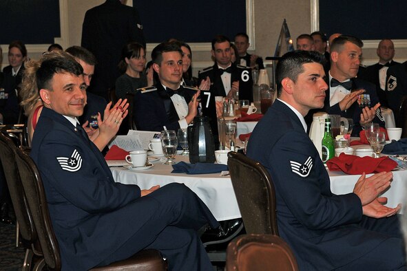 OFFUTT AIR FORCE BASE, Neb. - Members of Team Offutt applaud the accomplishments of graduates of class 09-D from the James M. McCoy Airman Leadership School at the Patriot Club April 2. "By completing ALS the graduates enhanced their leadership skills to guide the next generation of Airmen," Col. Thomas Goffus, 55th Mission Support Group commander said.