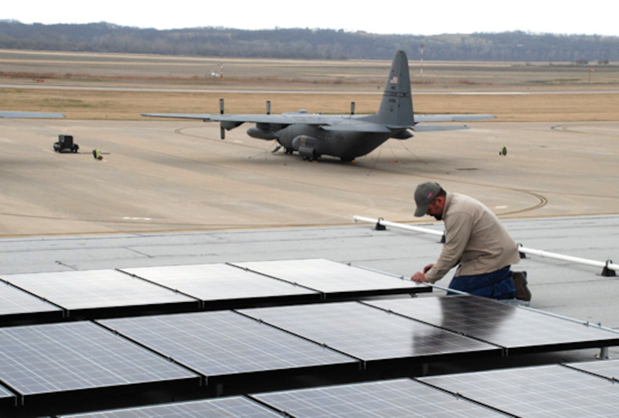 Solar panels are installed on a hanger at the 139th Airlift Wing hanger at Rosecrans airport in St. Joseph Missouri on March 29, 2009. (U.S. Air Force photo by Maj. Barb Denny) (RELEASED)
