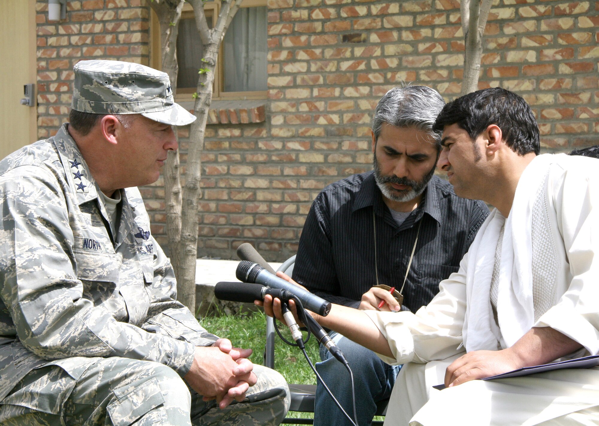 Lt. Gen. Gary North, Combined Forces Air Component commander for Southwest Asia, meets individually with Afghan media following his news conference during "Bagram Media Days" April 19. (U.S. Air Force photo/Col. August Schalkham) 