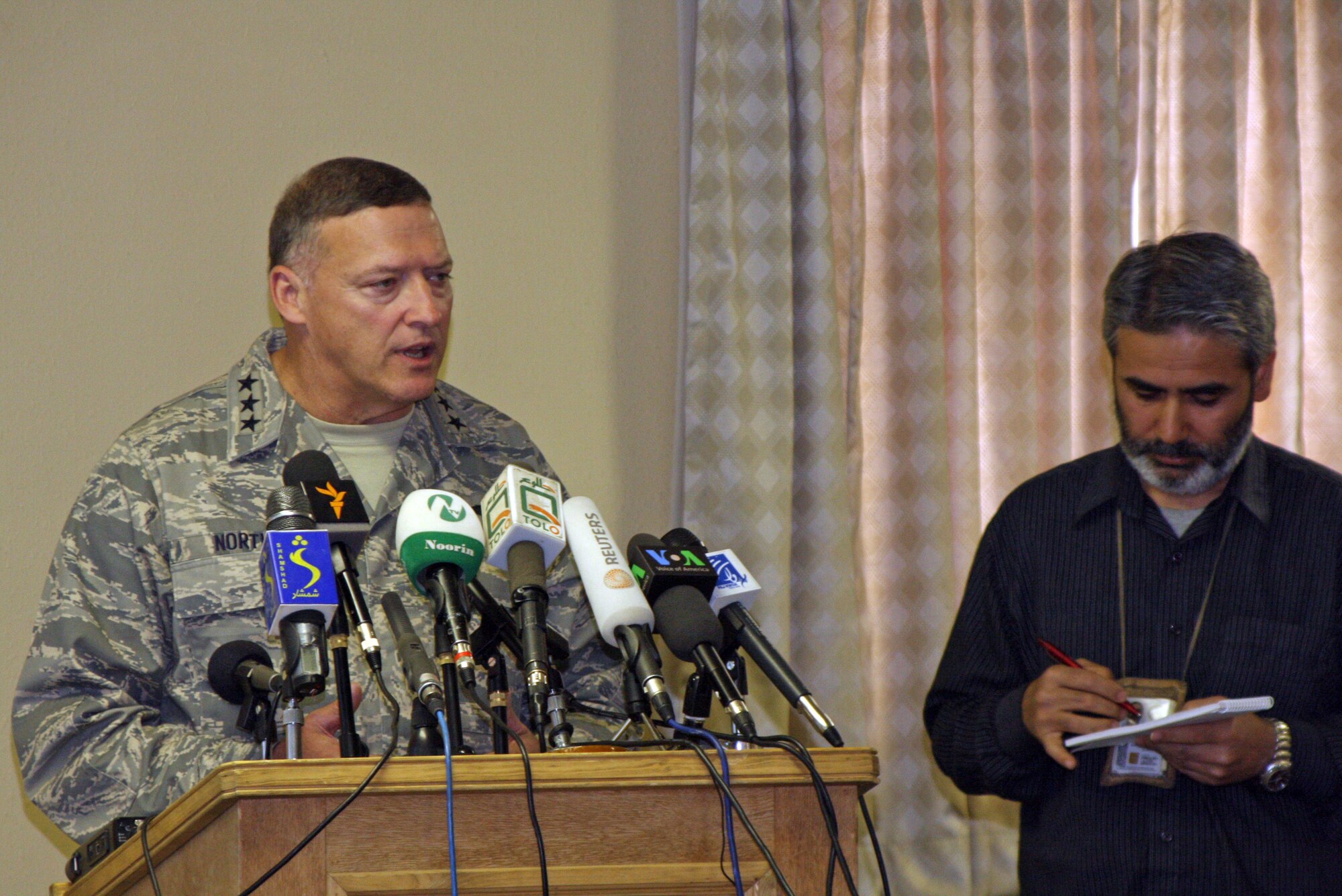 Lt. Gen. Gary North, Combined Forces Air Component commander for Southwest Asia, answers questions from Afghan media at his news conference during "Bagram Media Days" April 19. During his presentation, General North stressed the significant efforts made to reduce the risk to non-combatants during combat air operations in Afghanistan. (U.S. Army photo/Capt. Michael Greenberger) 