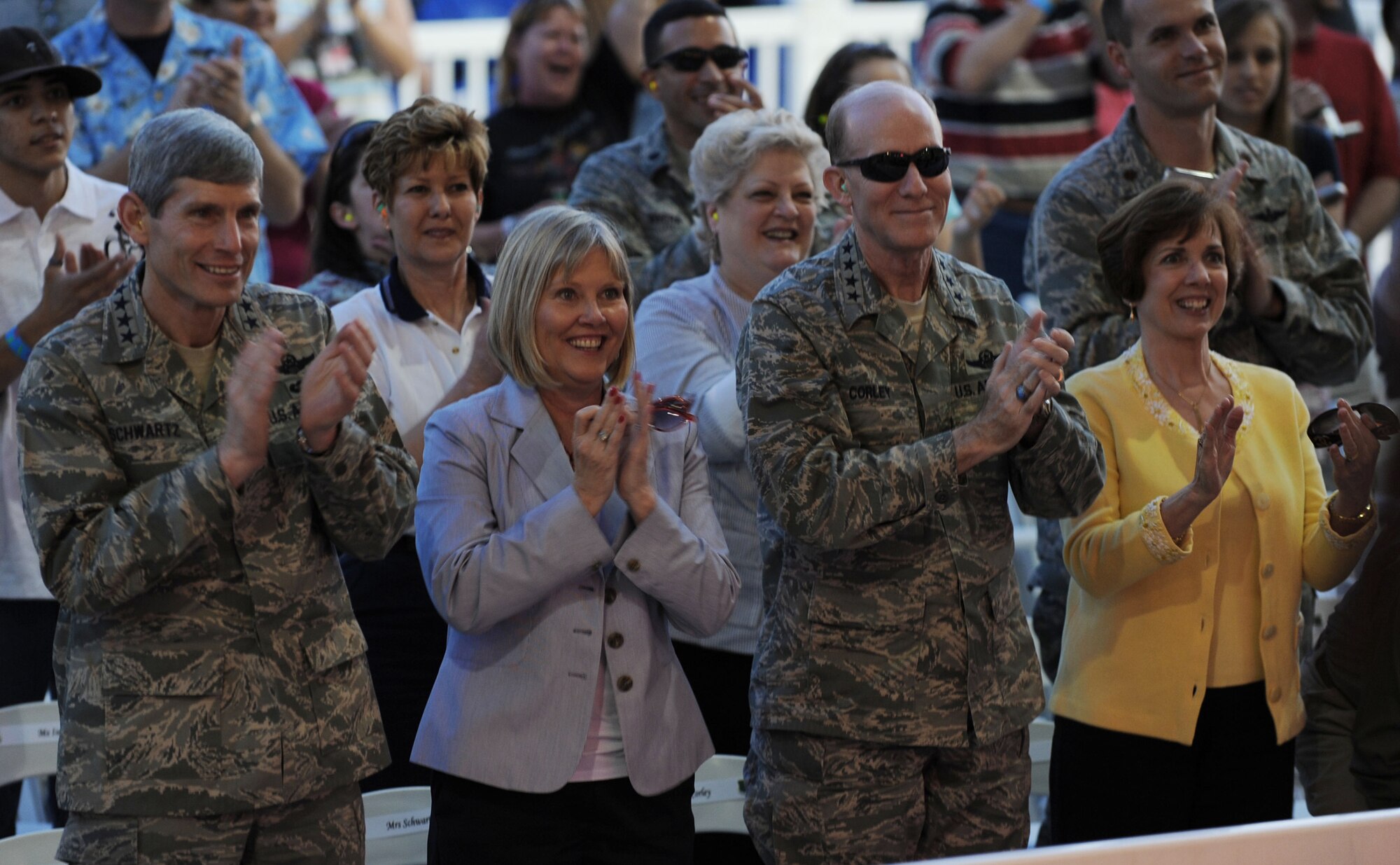 Gen. Norton Schwartz (from left), Air Force chief of staff, his wife Suzie, Gen. John D.W. Corley, Air Combat Command commander, and his wife Alice, enjoy the Kentucky Head Hunters concert during the Airpower over Hampton Roads event April 24. The first evening of the air show at Langley Air Force Base, Va., kicked off with a live concert from the country band, followed by a night air show and fireworks. (U.S. Air Force photo/Senior Airman Ashley Hawkins)