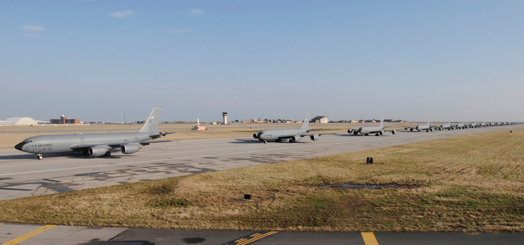 Twelve KC-135 Stratotankers form an aircraft "stampede" April 16 during an exercise designed to test the ability to launch a large number of aircraft in a short period of time from McConnell Air Force Base, Kan. Maintenance and operations personnel from the 931st Air Refueling Group helped plan and execute the total force stampede. The 931st is an Air Force Reserve unit and the 22nd Air Refueling Wing is its active-duty host unit at McConnell. (U.S. Air Force photo/Staff Sgt. Jamie Train)