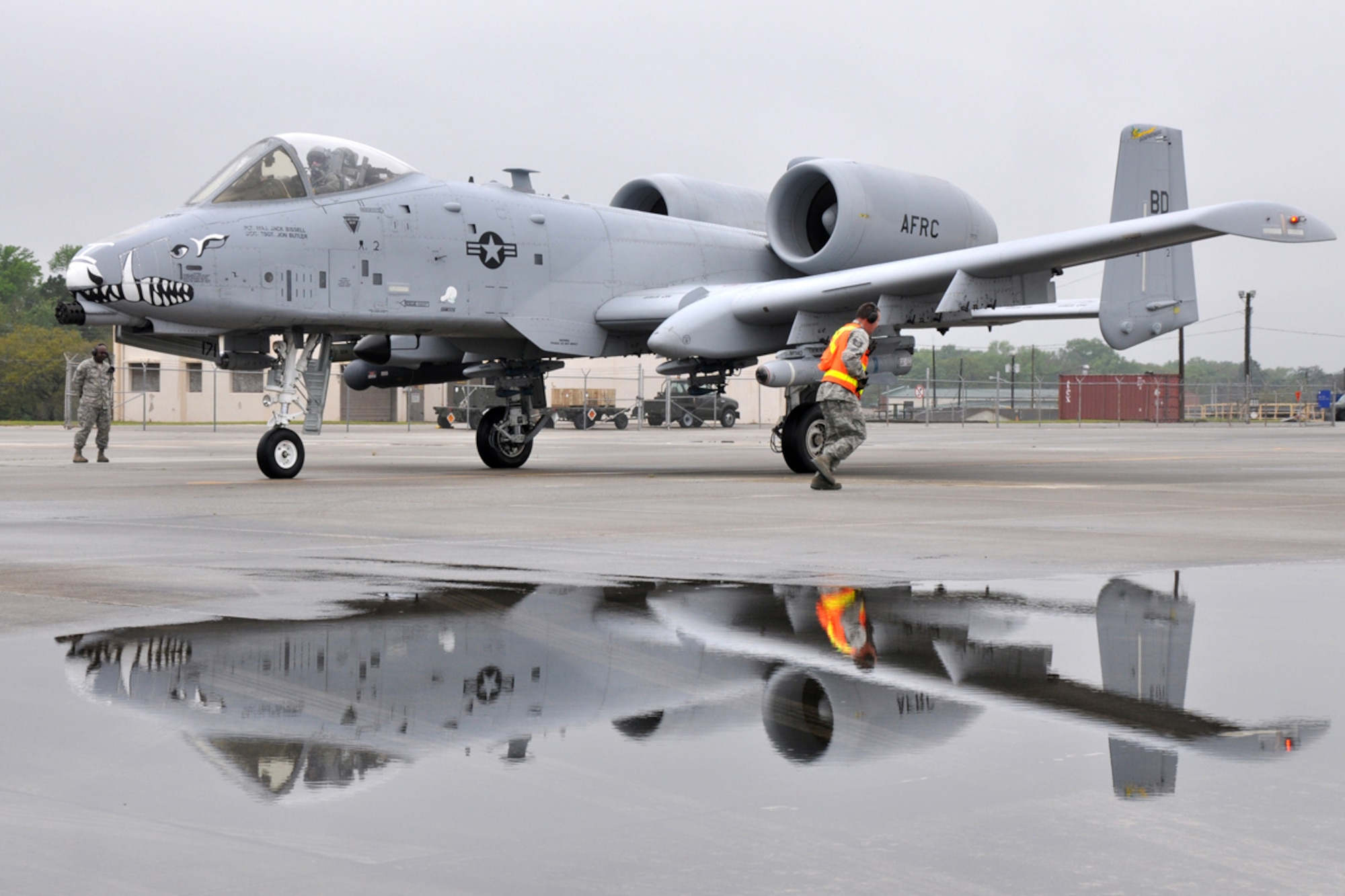 Airmen from the 917th Wing at Barksdale Air Force Base, La., prepare an A-10 Thunderbolt for takeoff at the Savannah Combat Readiness Training Center in Savannah, Ga., April 2, 2009. Airmen from the 917th WG and the 47th Fighter Squadron both from Barksdale are involved in training Joint Terminal Attack Controllers for 13 days during “Patriot Dixie.” (US Air Force photo/Tech. Sgt. Jeff Walston)