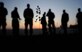 LANGLEY AIR FORCE BASE, Va. -- A weed sprouts at the end of the flightline as Airmen line up to begin clearing foreign object debris April 27. The post-air show FOD walk cleaned up what was left behind from the fun filled weekend of exhibiting aircraft and showing appreciation to the local community. (U.S. Air Force photo/Airman Rebecca Montez)