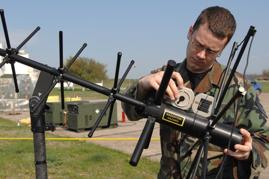 BEZMER AIR BASE, Bulgaria – Staff Sgt. Justin Vandevender, 1st Combat Communications Squadron ground radio technician, aligns the elevation of a high-gain satellite communications antenna.  Sergeant Vandevender deployed to Bezmer Air Base, Bulgaria to provide communications support during a U.S. and Bulgarian Air Forces training exercise. Sergeant Vandevender is deployed from Ramstein Air Base, Germany.  (U.S. Air Force photo by Master Sgt. Bill Gomez) 