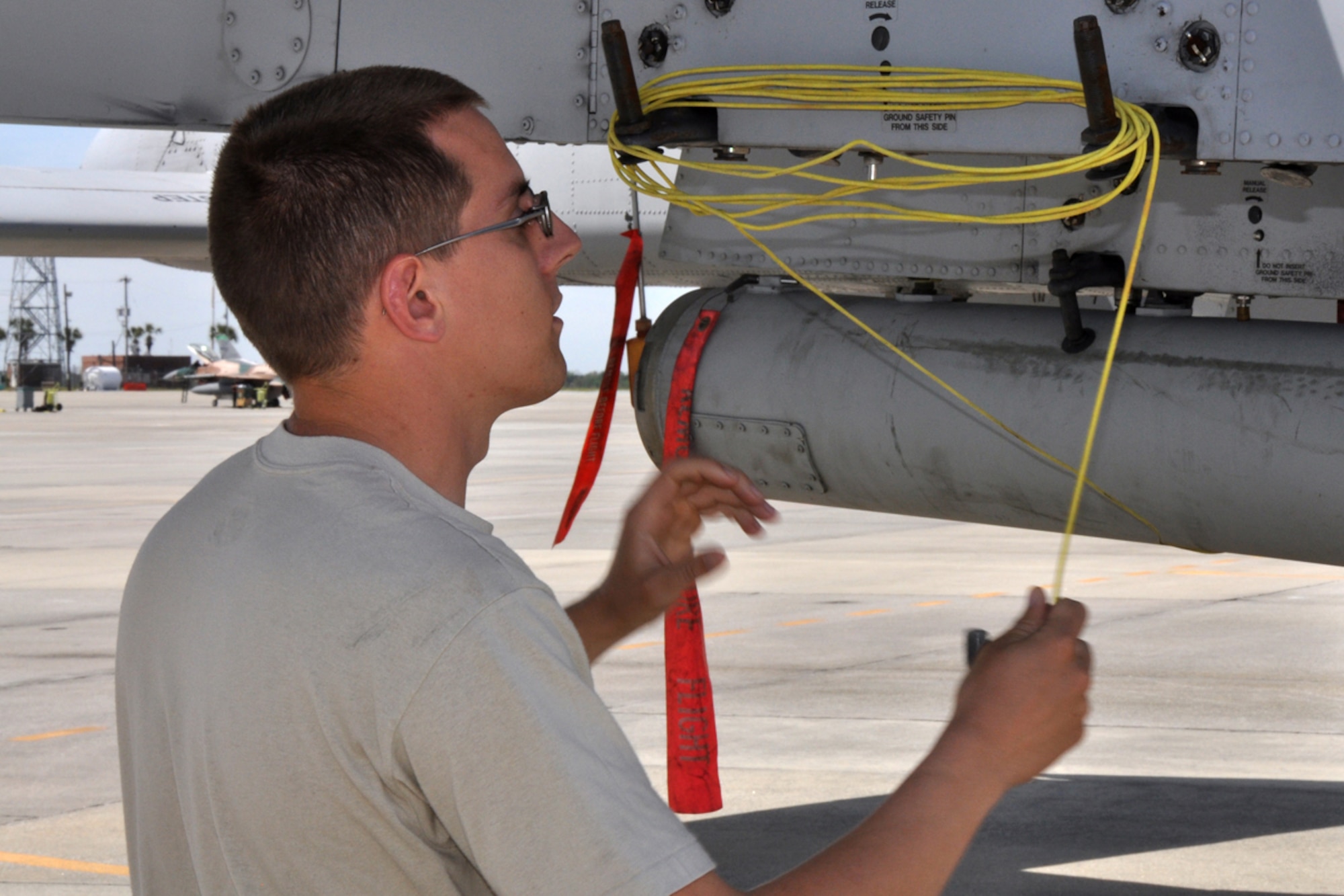 Staff Sgt. Dale Hugo, crew chief, 717th Aircraft Maintenance Squadron, Barksdale Air Force Base, La., wraps and stows a grounding cord on an A-10 Thunderbolt, March 30, 2009, before it is towed to the end of the ramp at the Combat Readiness Training Center in Savannah, Ga., to have its engines run up.  Airmen from the 717th AMXS maintained A-10 jets from the 47th Fighter Squadron at Barksdale AFB while they that supported training evolutions for Joint Terminal Attack Controllers with the 15th Air Support Operations Squadron at Fort Stewart, Ga. (US Air Force photo/Tech. Sgt. Jeff Walston) 
