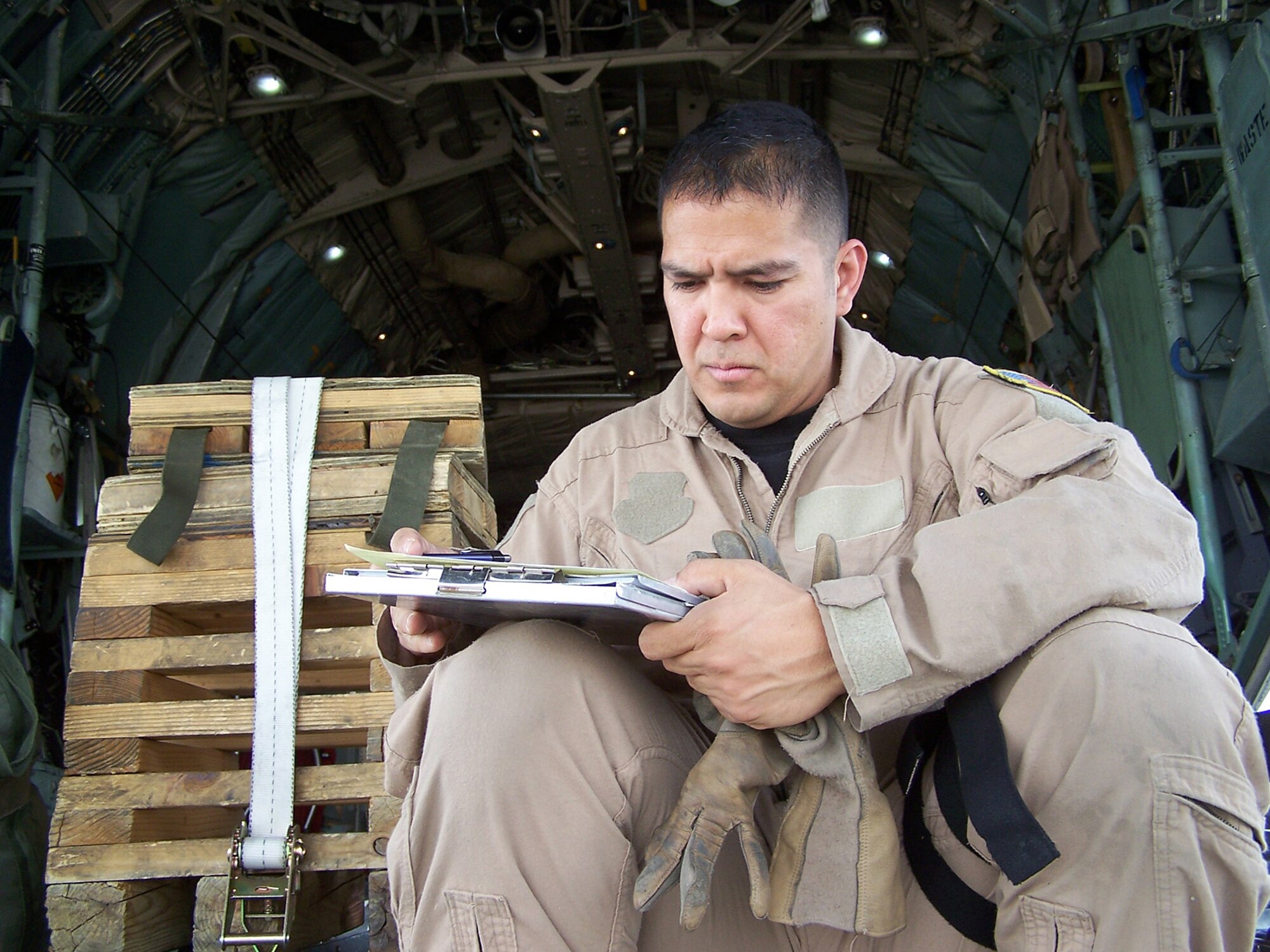 SOUTHWEST ASIA -- Staff Sgt. Pablo Herrera, 737th Expeditionary Airlift Squadron instructor loadmaster, is deployed from the 40th Airlift Squadron at Dyess Air Force Base, Texas. (U.S. Air Force courtesy photo)