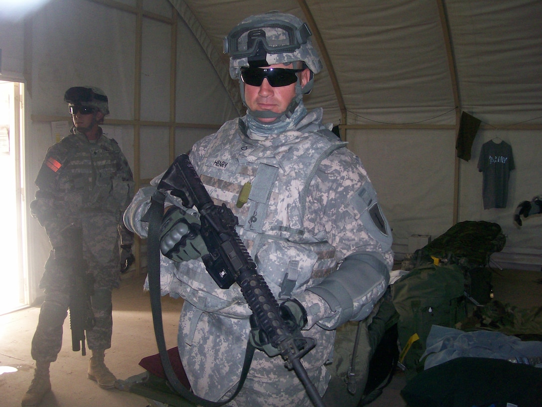 Army Pfc. Paul Henry, 42, was a car salesman before he decided to enlist in the Army and train with recruits who were half his age. U.S. Army Photo by 1st Lt. Christopher Gregg