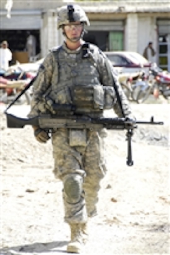 U.S. Army Pfc. Keith Vallette patrols a local bazaar near Combat Outpost Sabari, Afghanistan, on April 23, 2009.  Vallette is assigned to Delaware Company, 1st Battalion, 501st Infantry Regiment, 4th Brigade, 25th Infantry Division.  