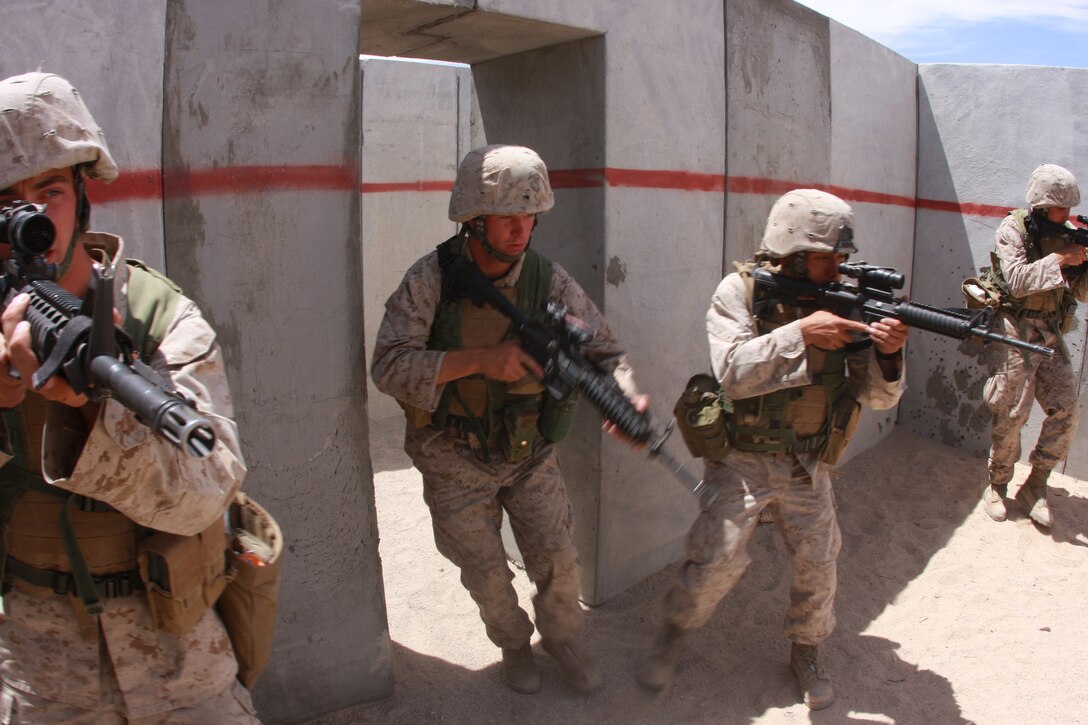 Marines with Company C, 1st Tank Battalion, clear a room at the Combat Center’s Range 111 during their urban warfare training. The company undertook urban warfare training April 28 at the Combat Center’s Range 111 as part of their pre-deployment training process.