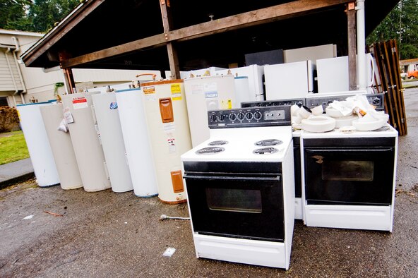 Water heaters, stoves, doors and ceiling fans will be donated to a secondhand warehouse in Thurston County run by Habitat for Humanity. (U.S. Air Force photo/Abner Guzman)