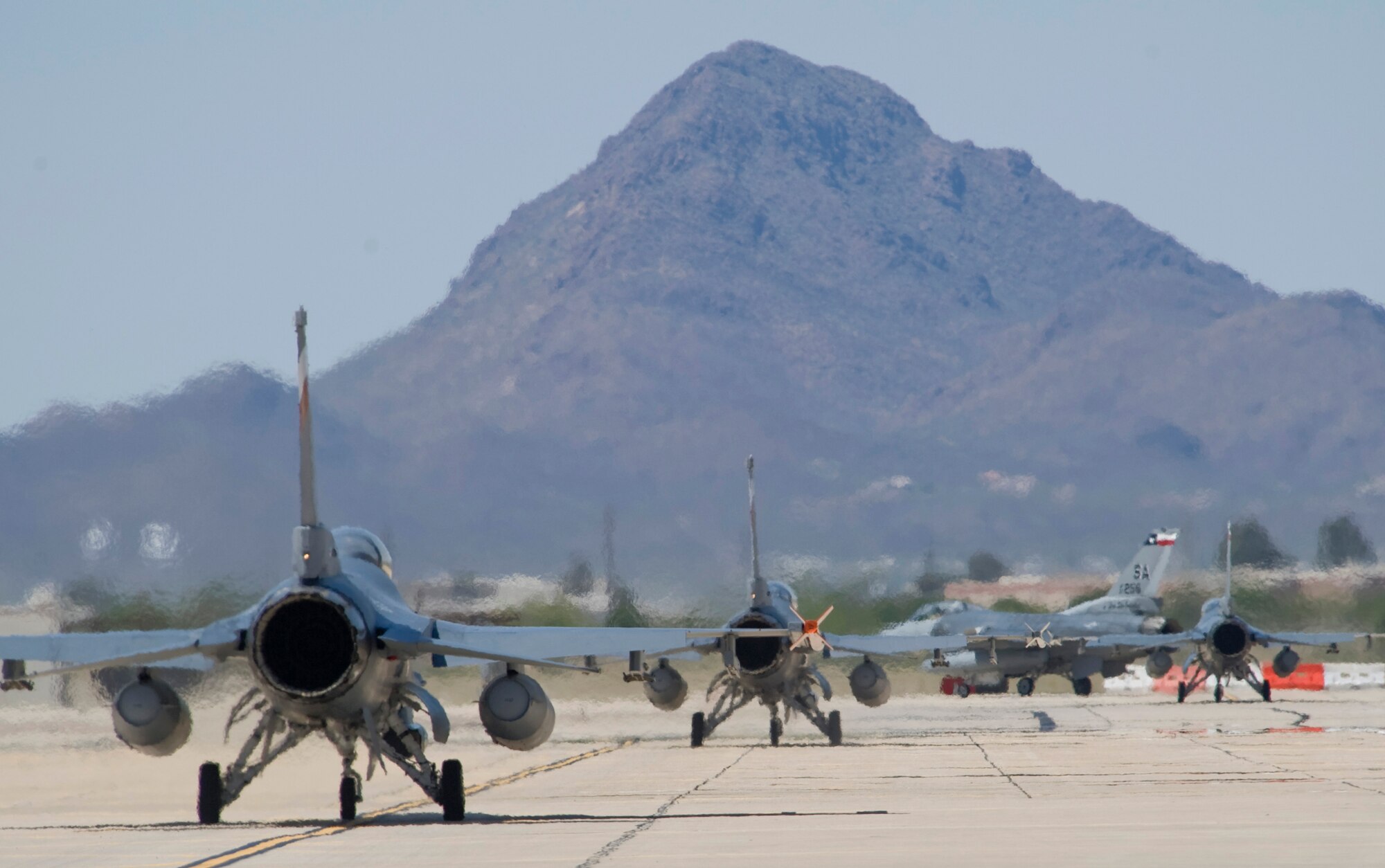 F-16 Fighting Falcons assigned to the 149th Fighter Wing from San Antonio depart for training sorties during Exercise Coronet Cactus April 24 at Davis-Monthan Air Force Base, Ariz.  The 149th Fighter Wing is a Texas Air National Guard unit and trains active duty F-16 Fighting Falcon pilots.  (U.S. Air Force photo/Master Sgt Jack Braden)