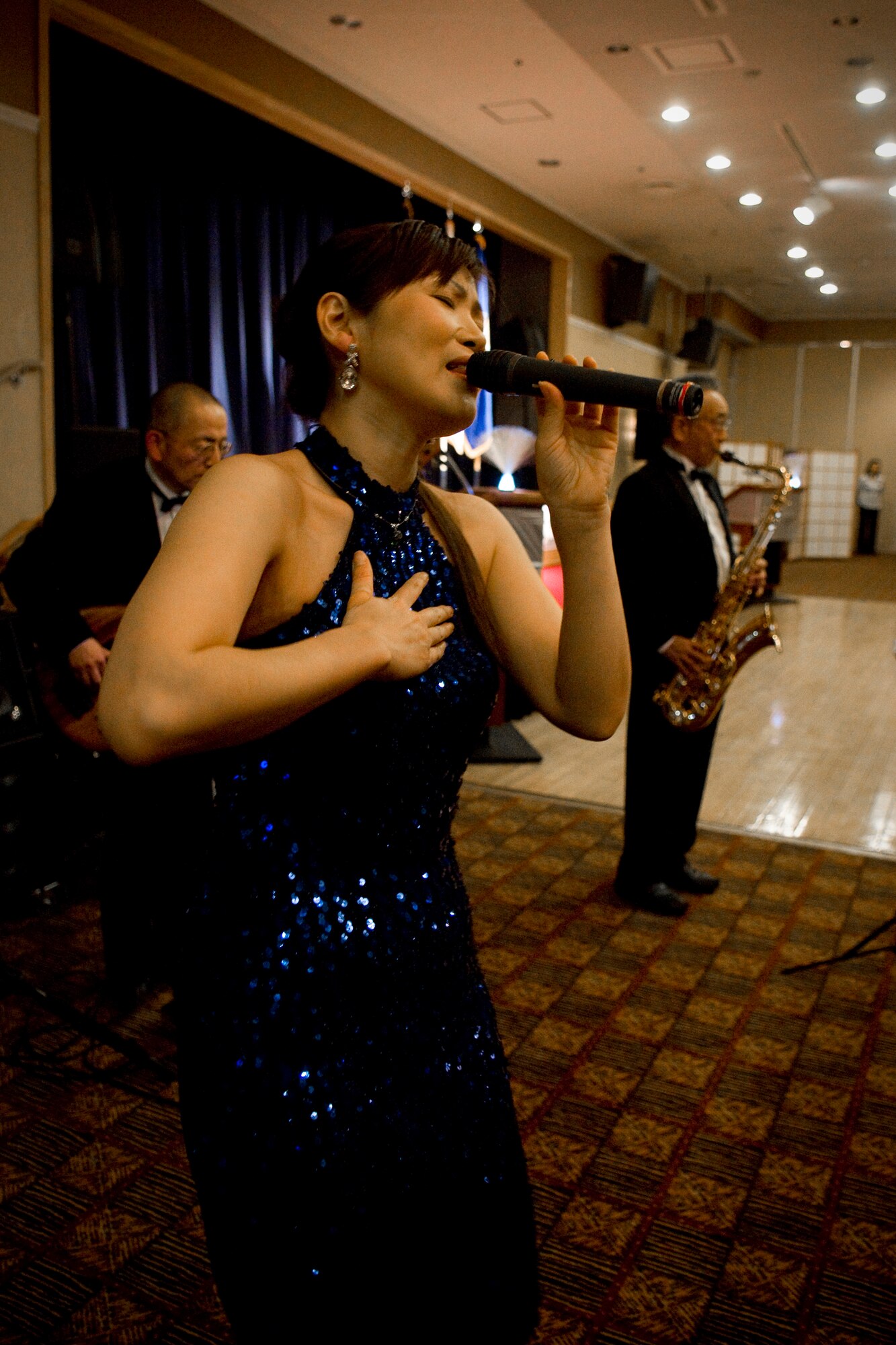MISAWA AIR BASE, Japan -- Members of Chiaki, a band from Morioka, Japan, perform during the 22nd annual Japan Day Appreciation Dinner April 24, 2009. The band performed renditions of popular American jazz songs as well as Japanese pieces. (U.S. Air Force photo by Senior Airman Jamal D. Sutter)