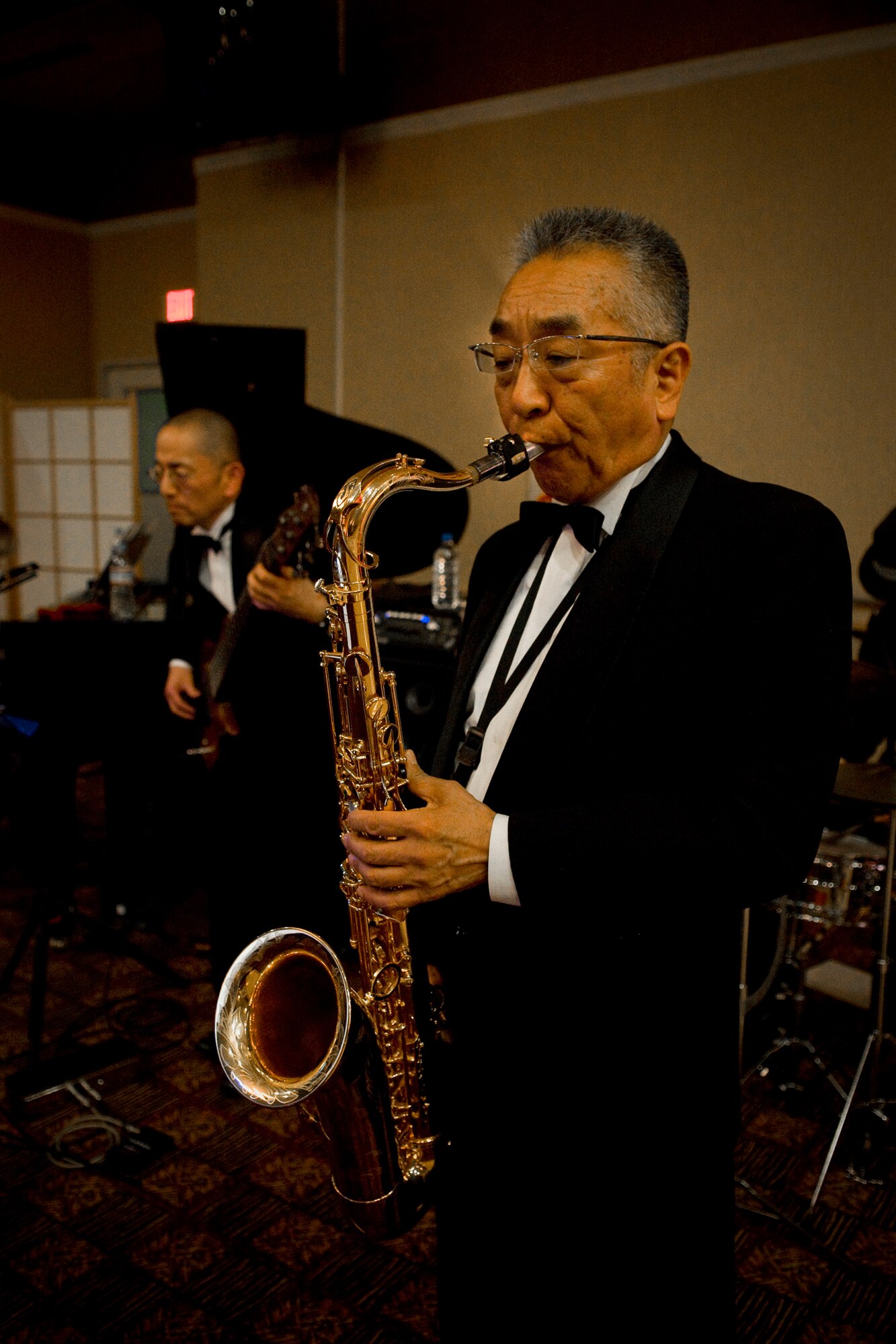 MISAWA AIR BASE, Japan -- Members of Chiaki, a band from Morioka, Japan, perform during the 22nd annual Japan Day Appreciation Dinner April 24, 2009. The band entertained the crowd as guests arrived and dinner was served. (U.S. Air Force photo by Senior Airman Jamal D. Sutter)