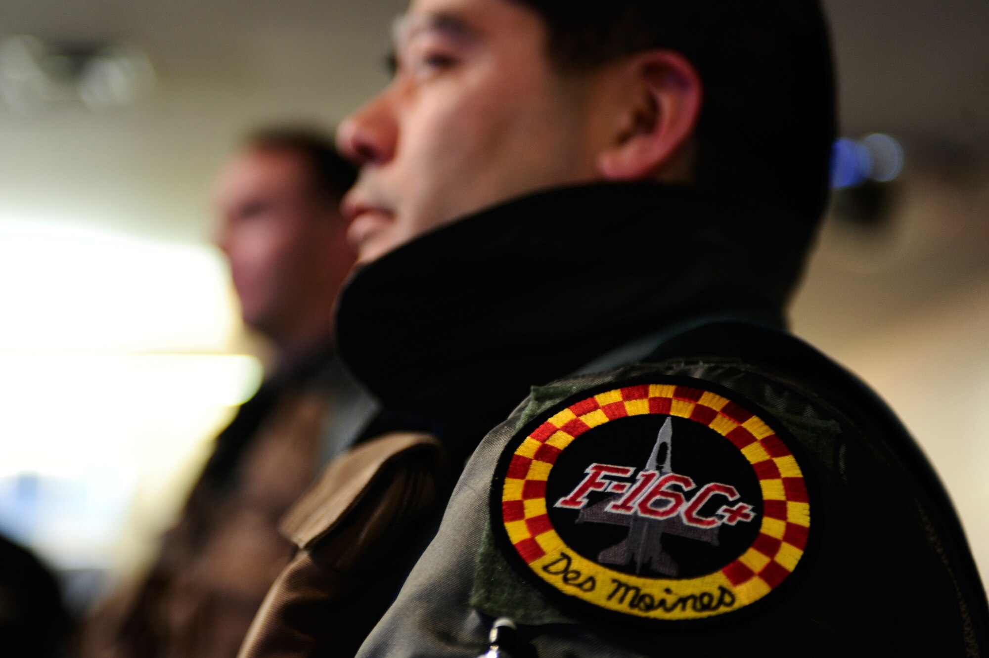Lt. Col. Michael Kato, 124th Fighter Squadron, Des Moines, Iowa, goes over pre-flight information prior to stepping during RED FLAG-Alaska 09-2, April 24, 2009, Eielson Air Force Base, Alaska.  This exercise enables aviation units to sharpen their skills by flying 10 simulated combat sorties in a realistic threat environment.  (U.S. Air Force Photo/Senior Airman Jonathan Snyder) (Released)
