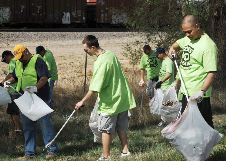 CANNON AIR FORCE BASE, N.M. -- Airmen from the 27th Special Operations Civil Engineer Squadron pick up trash on Mabry Drive in Clovis, N.M., April 25. The Great American Cleanup drew 337 volunteers, 235 of whom were Cannon Airmen  (U.S. Air Force photo/Greg Allen)