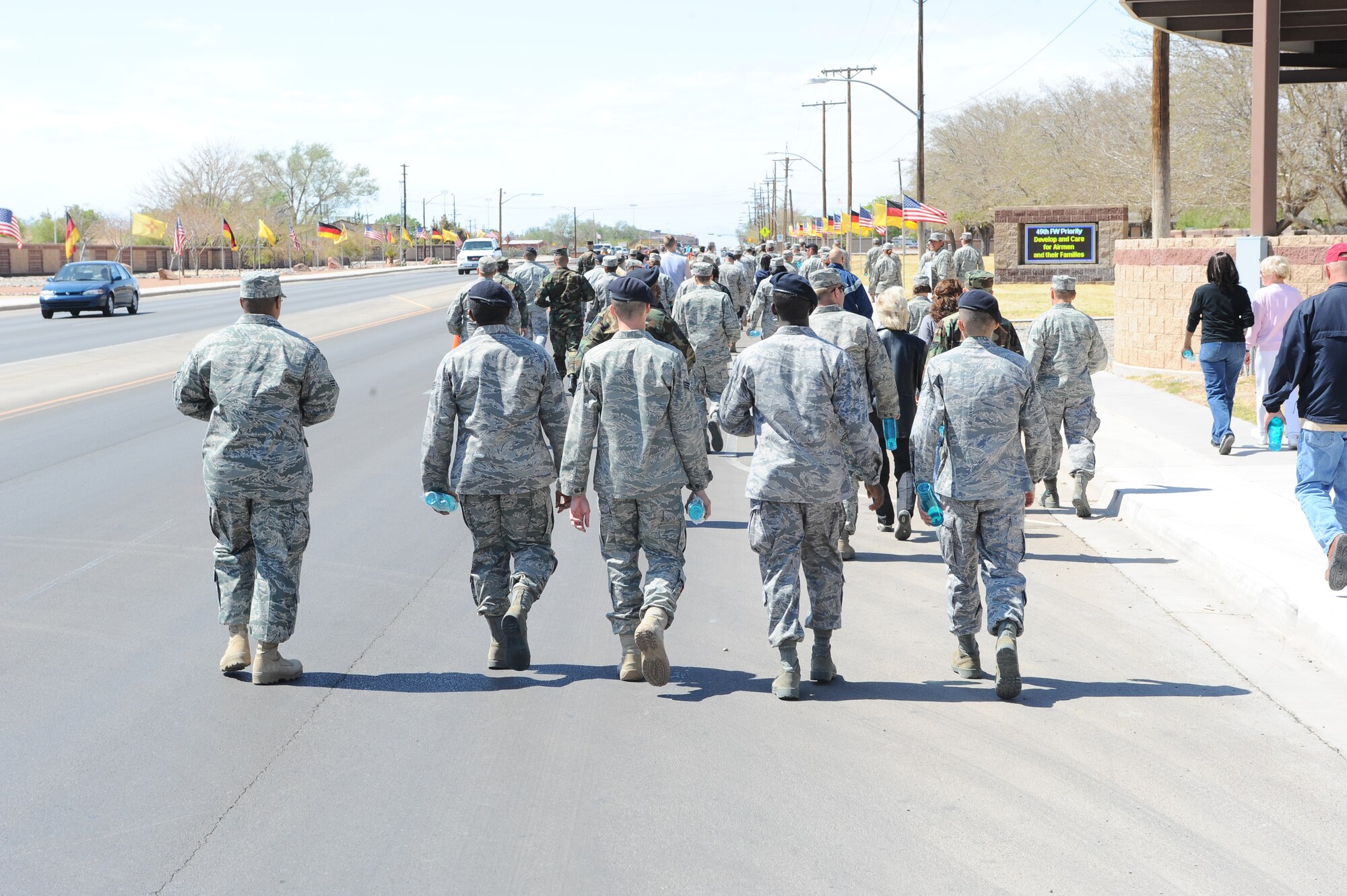 Holloman Air Force Base personnel participate in the 1st annual "My Strength is Defending" Walk for Sexual Assault Awareness. The walk started at Heritage Park and proceeded down First Street to the main gate and back, April 17. April is Sexual Assault Awareness Month. (U.S. Air Force photo/ Airman 1st Class DeAndre Curtiss)

